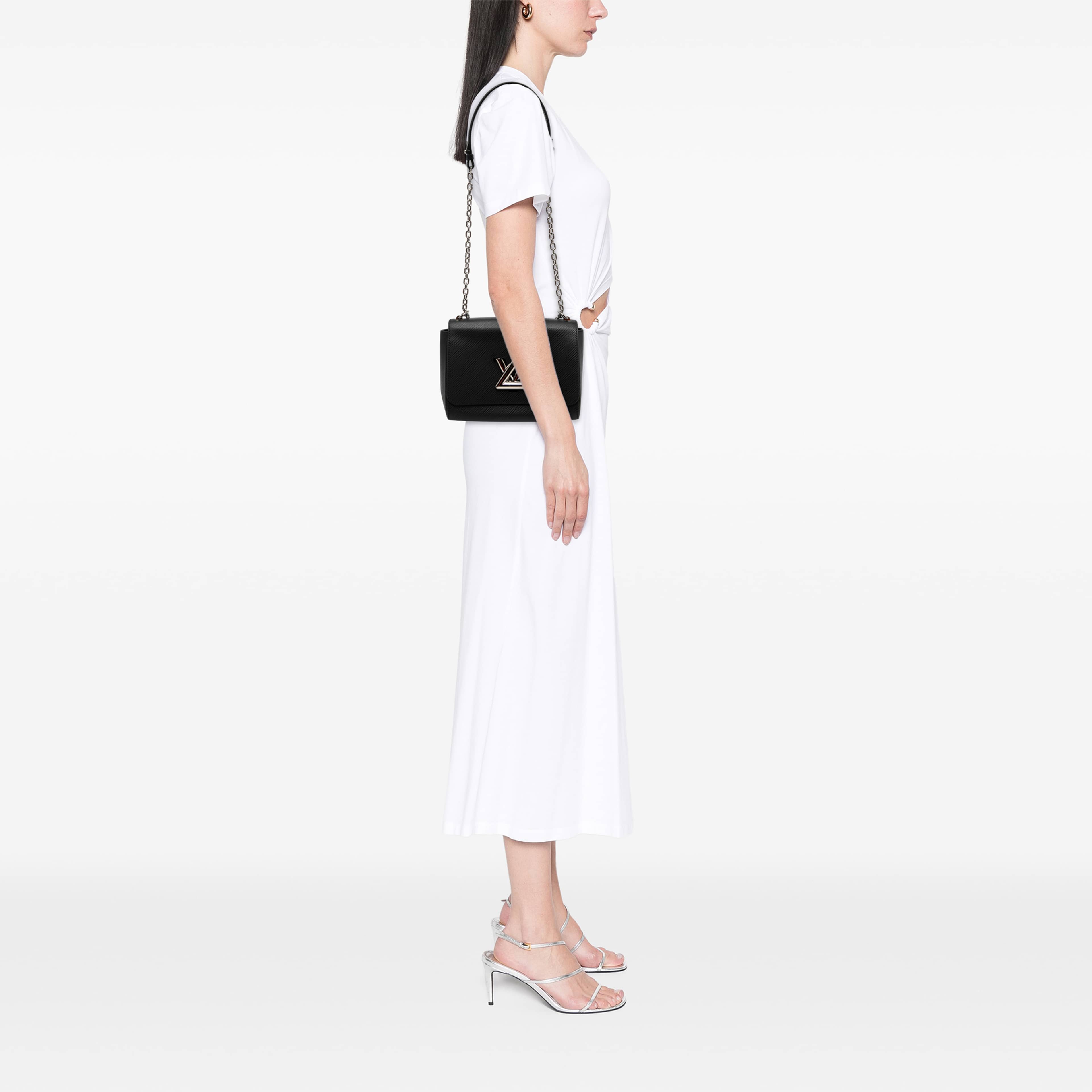 Louis Vuitton Epi Twist Mm, från Luxclusif, i färgen svart. Klicka för att öppna bilden i stort format