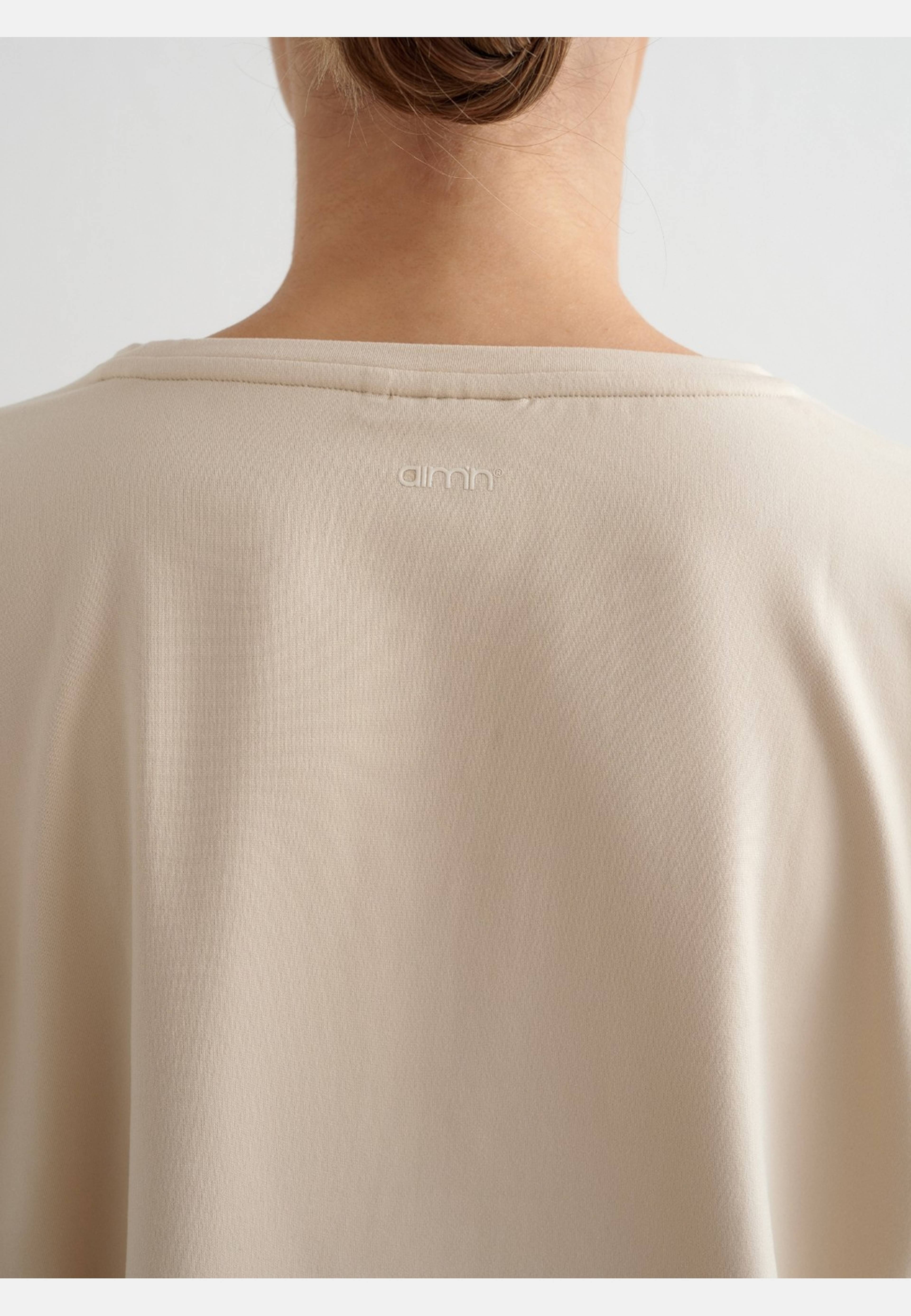 Soft Basic Roll Sleeve Top, från aim'n, i färgen café au lait. Klicka för att öppna bilden i stort format