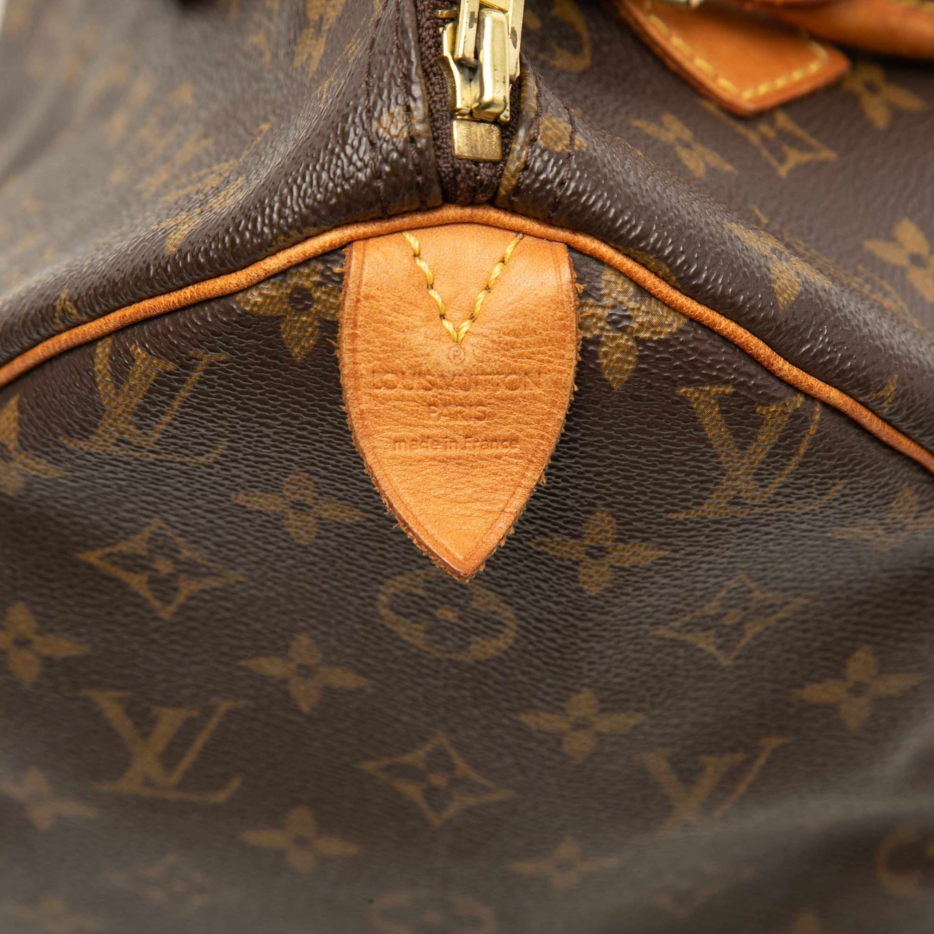 Louis Vuitton Monogram Speedy 30, från Luxclusif, i färgen brun. Klicka för att öppna bilden i stort format