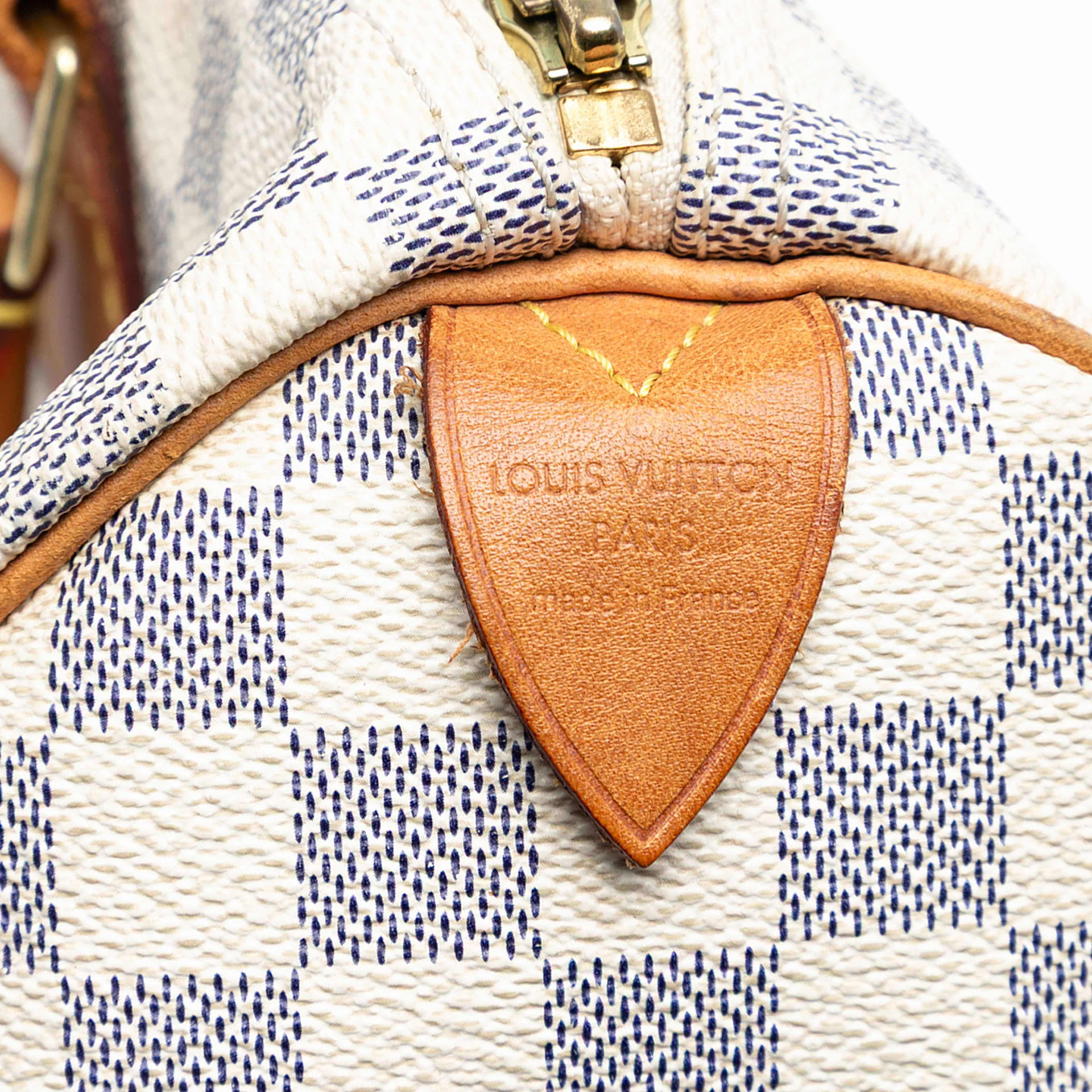 Louis Vuitton Damier Azur Speedy 30, från Luxclusif, i färgen white. Klicka för att öppna bilden i stort format