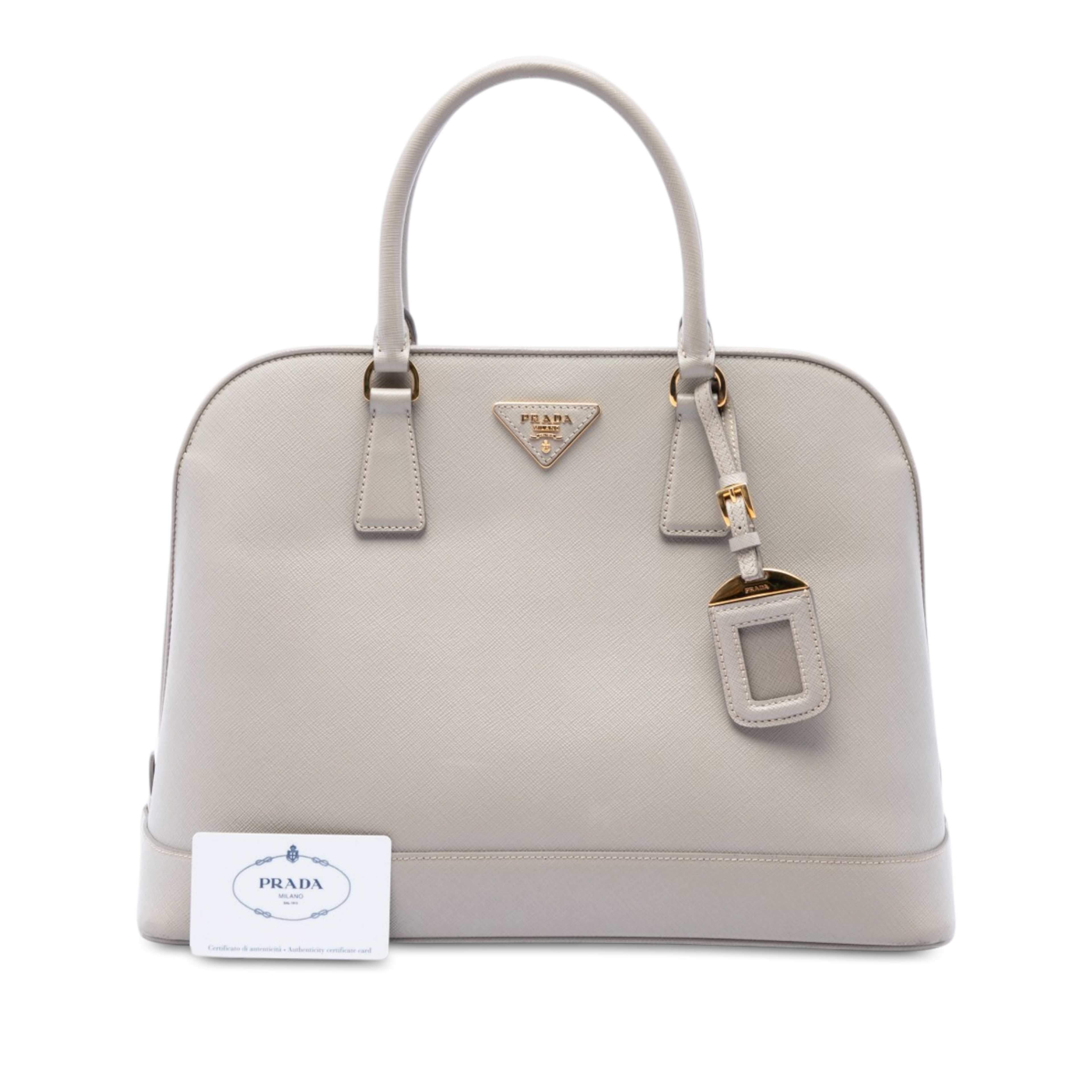 Prada Large Saffiano Lux Open Promenade Satchel, från Luxclusif, i färgen vit. Klicka för att öppna bilden i stort format