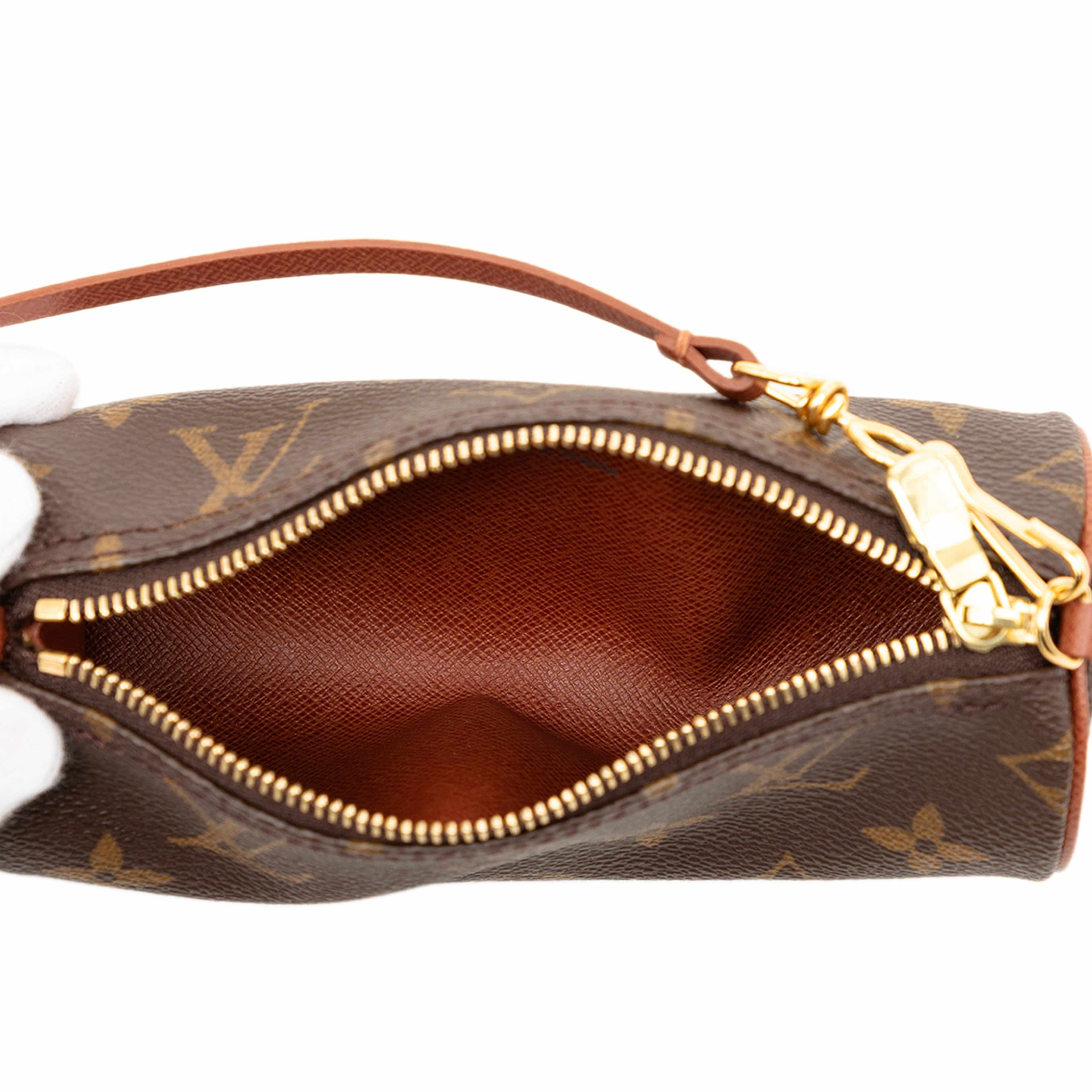 Louis Vuitton Monogram Papillon Pochette, från Luxclusif, i färgen brun. Klicka för att öppna bilden i stort format