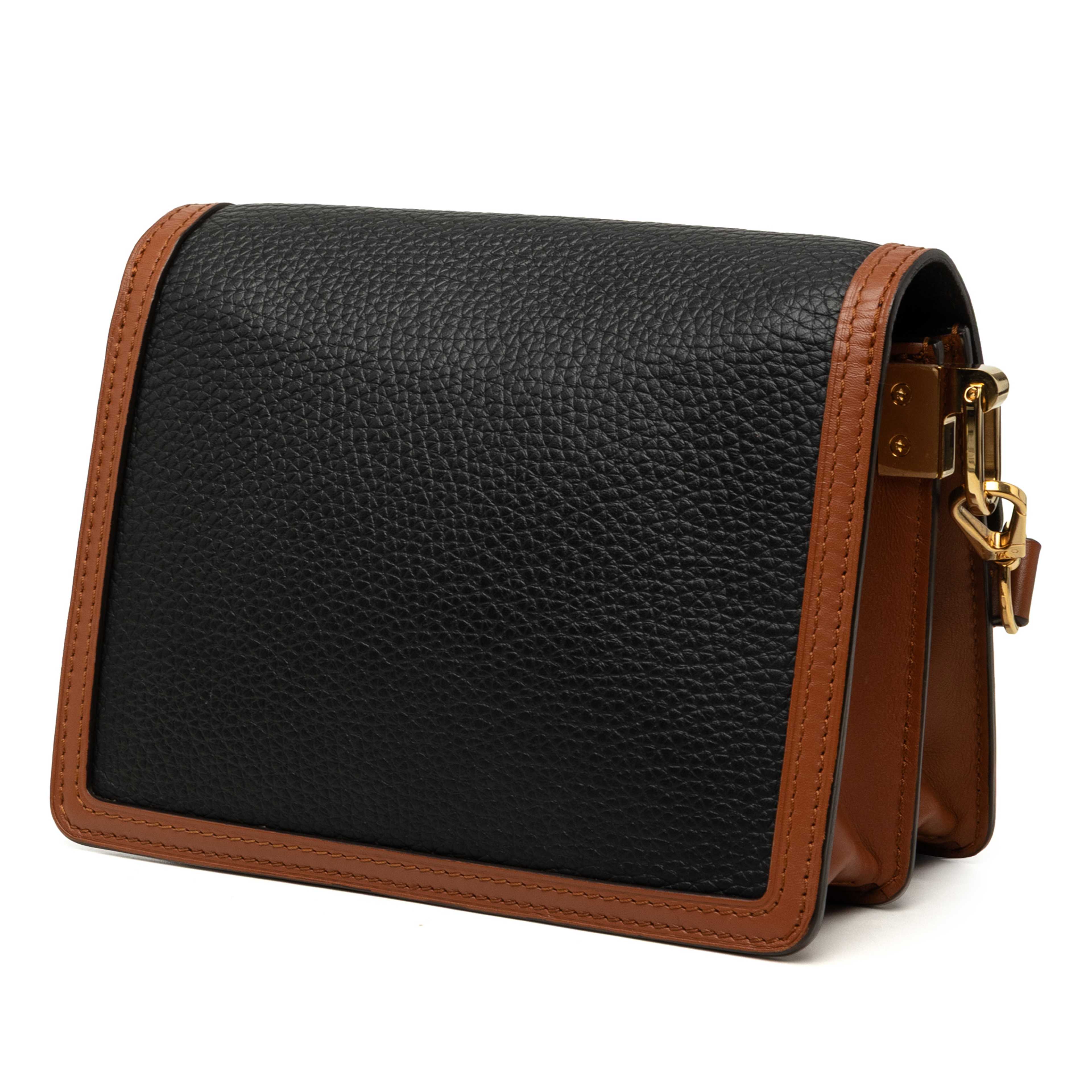 Louis Vuitton Taurillon Mini Dauphine, från Luxclusif, i färgen svart. Klicka för att öppna bilden i stort format