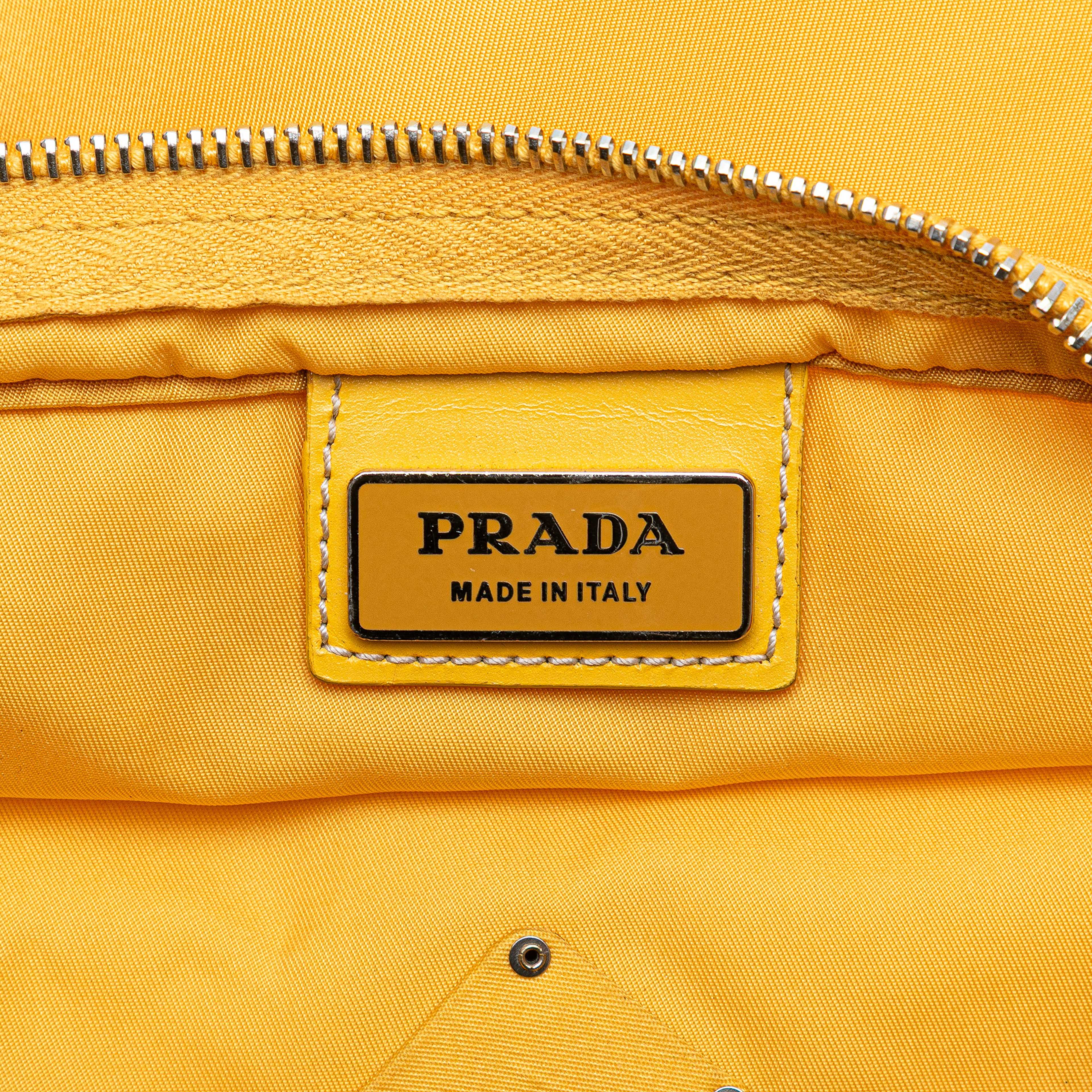 Prada Tessuto Zip Top Crossbody, från Luxclusif, i färgen yellow. Klicka för att öppna bilden i stort format