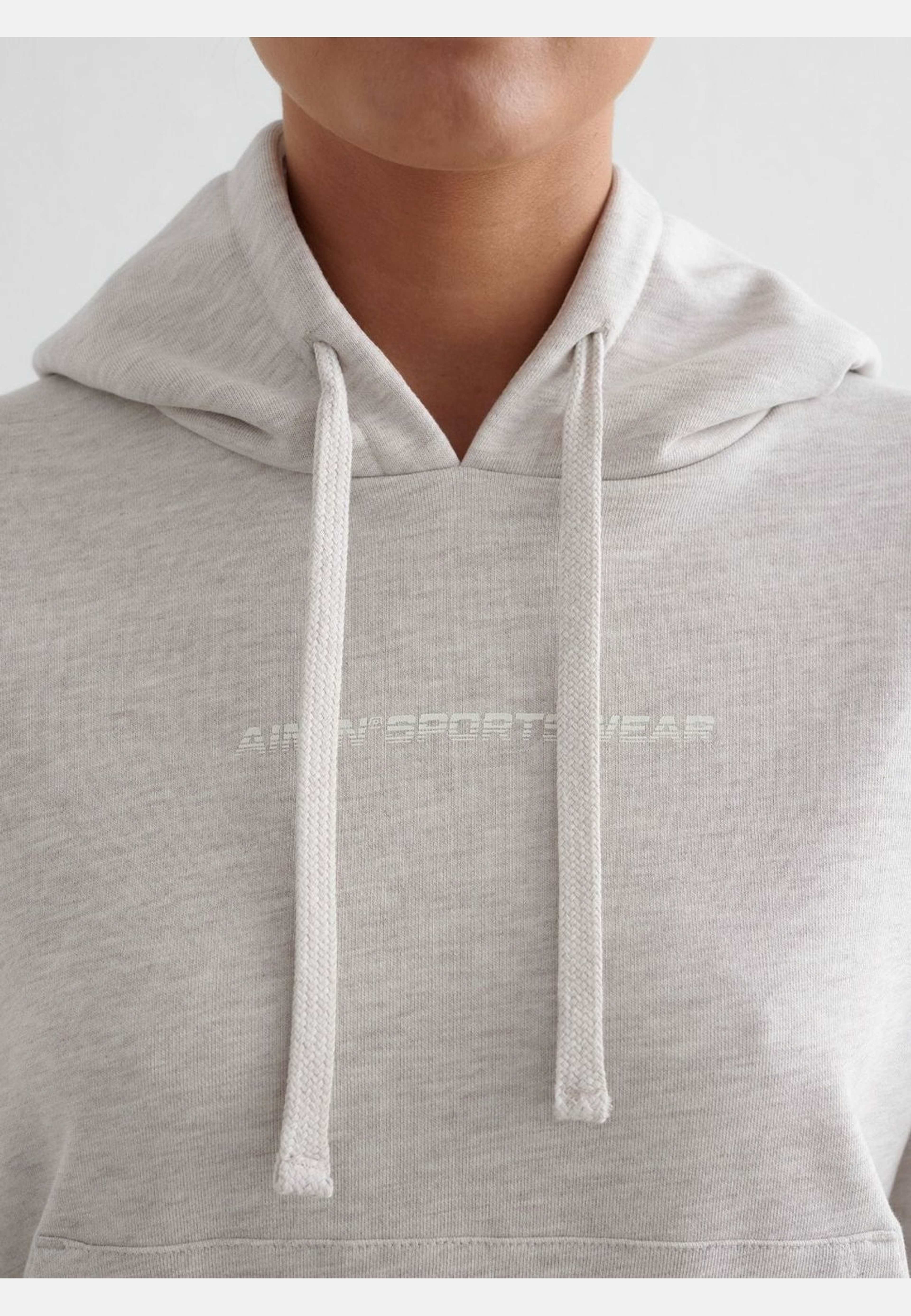 Chunky Terry Hood, från aim'n, i färgen beige melange. Klicka för att öppna bilden i stort format