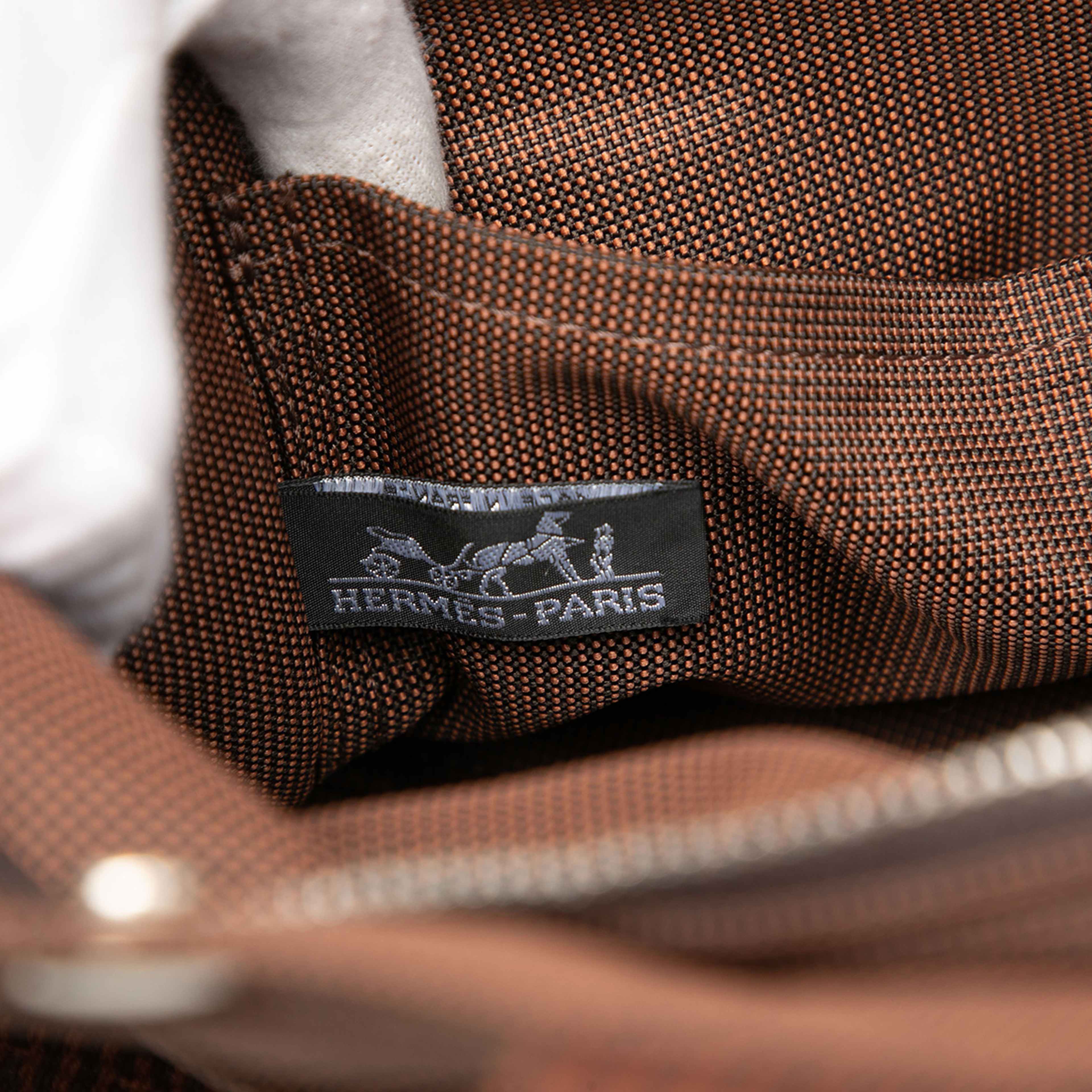 Hermès Canvas Herline Backpack Pm, från Luxclusif, i färgen brown. Klicka för att öppna bilden i stort format