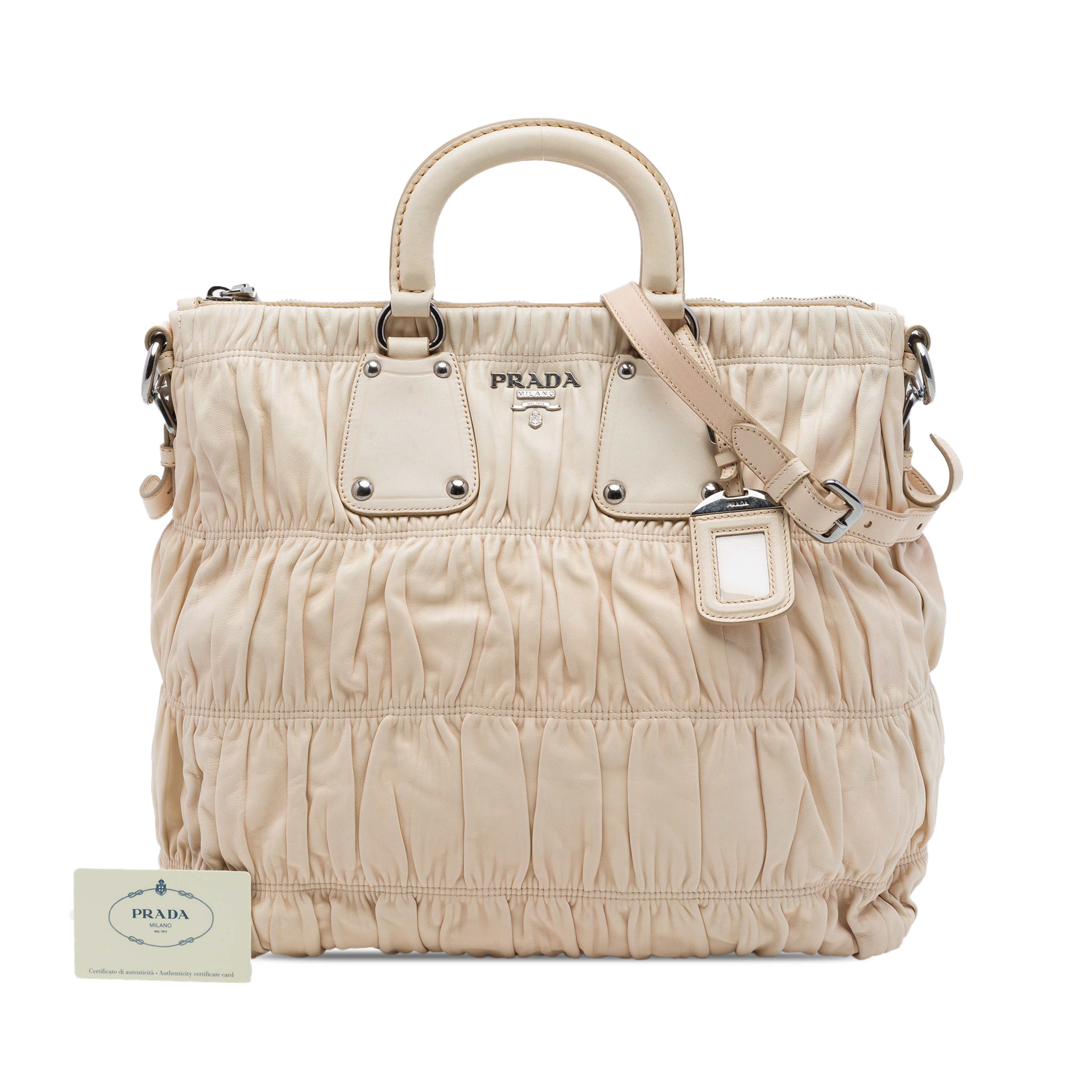 Prada Nappa Gaufre Satchel, från Luxclusif, i färgen beige. Klicka för att öppna bilden i stort format