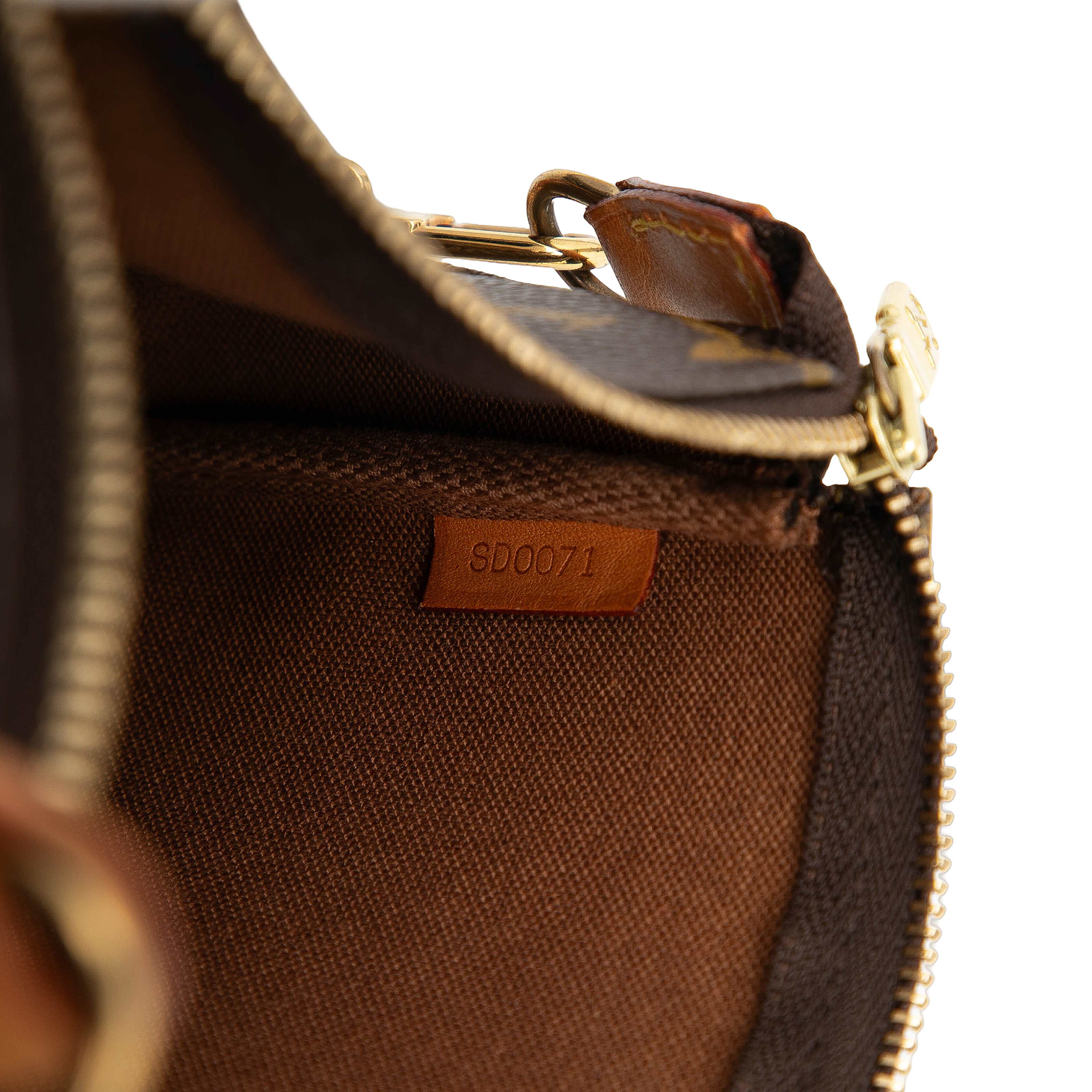 Louis Vuitton Monogram Pochette Accessoires, från Luxclusif, i färgen brown. Klicka för att öppna bilden i stort format