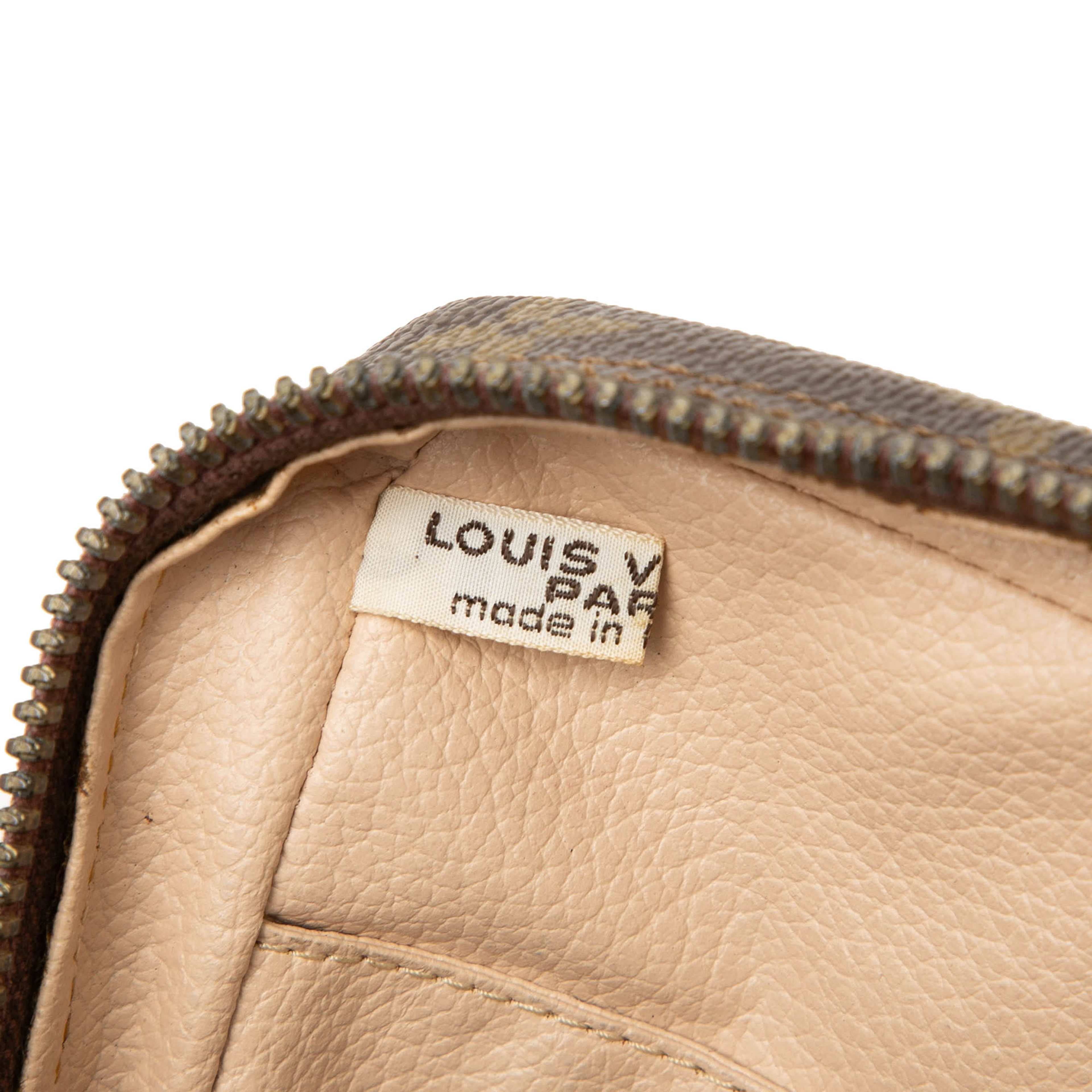 Louis Vuitton Monogram Trousse Toilette 23, från Luxclusif, i färgen brun. Klicka för att öppna bilden i stort format