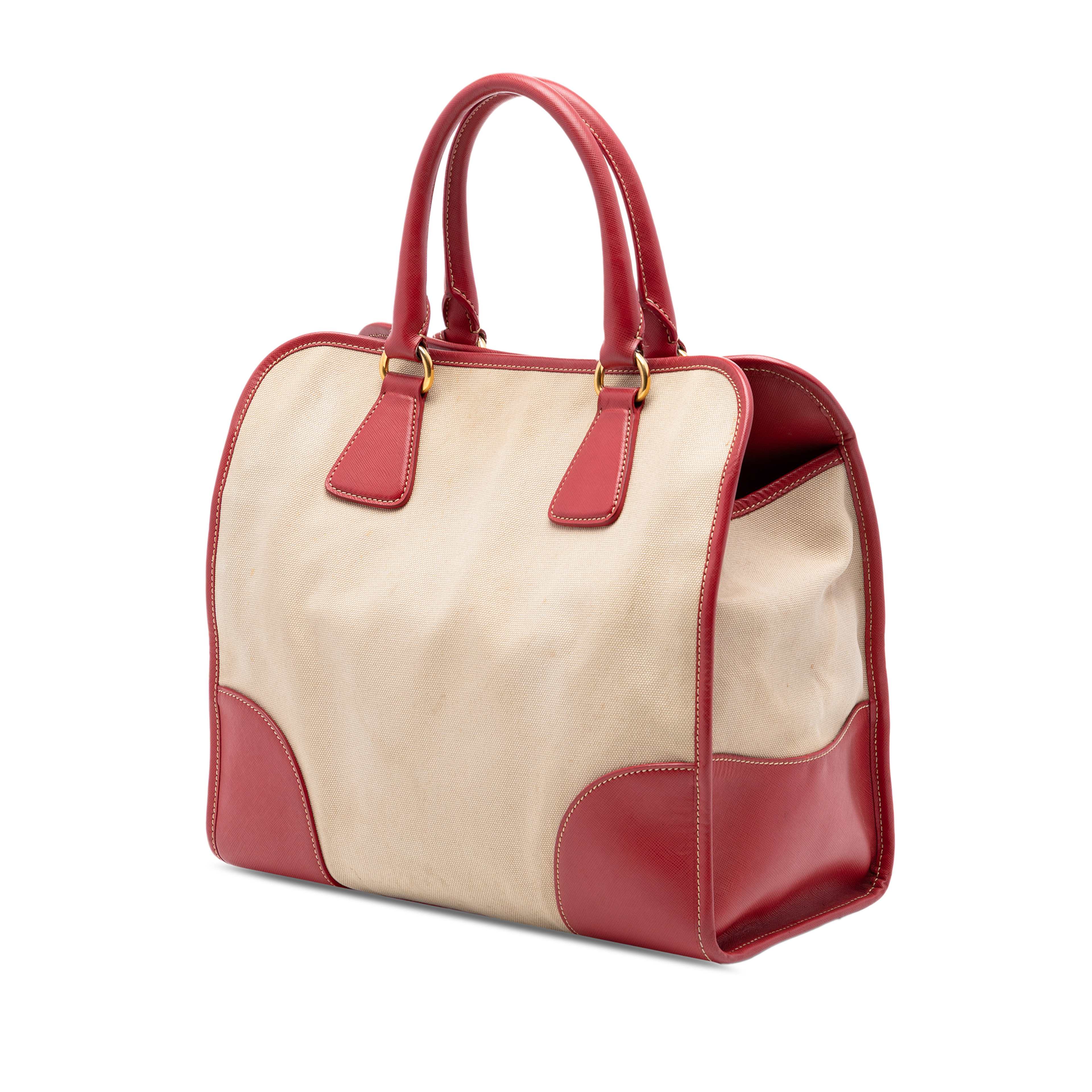 Prada Saffiano Trimmed Canvas Canapa Satchel, från Luxclusif, i färgen beige. Klicka för att öppna bilden i stort format