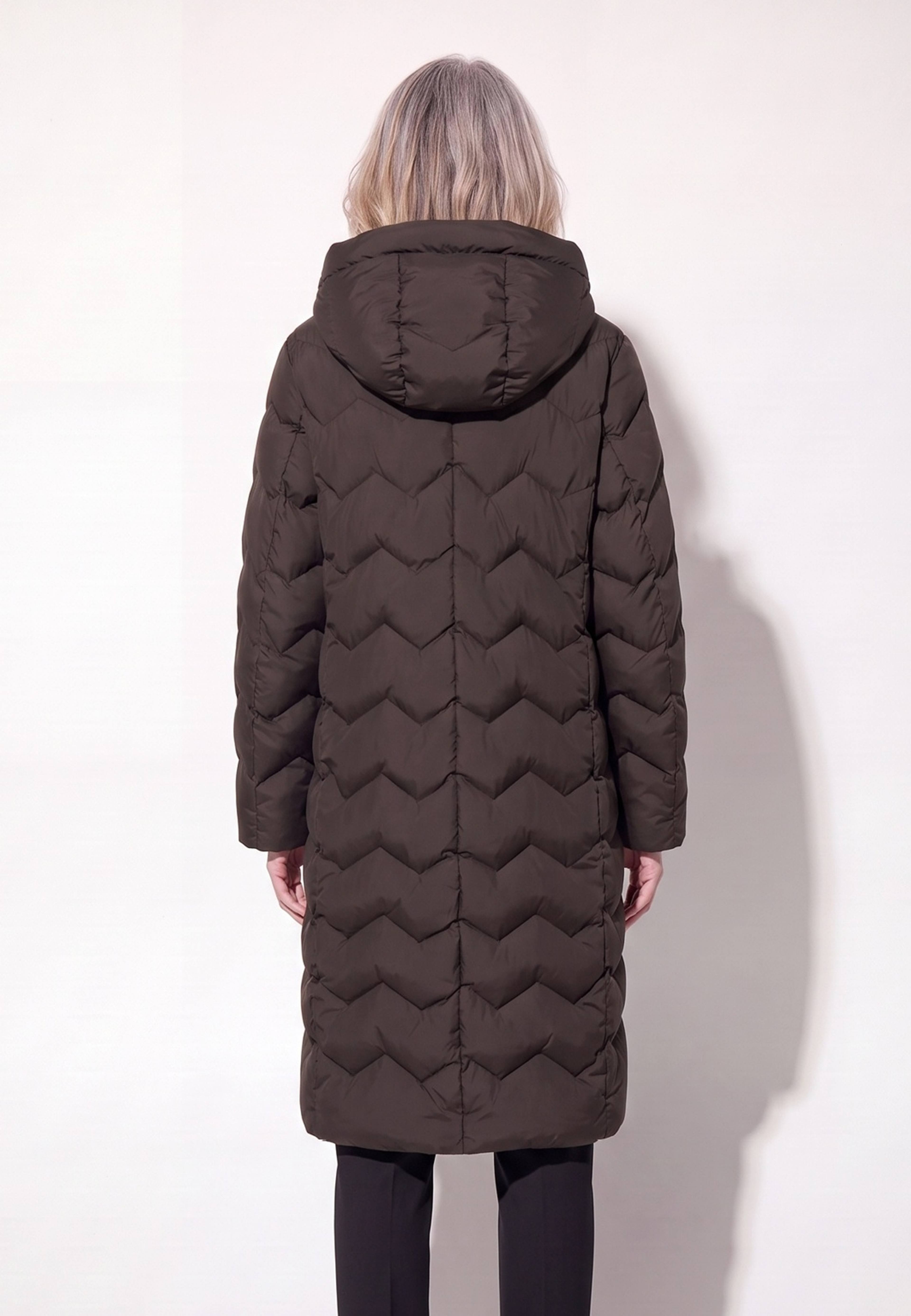 Moa Coat, från Saki, i färgen dark brown. Klicka för att öppna bilden i stort format