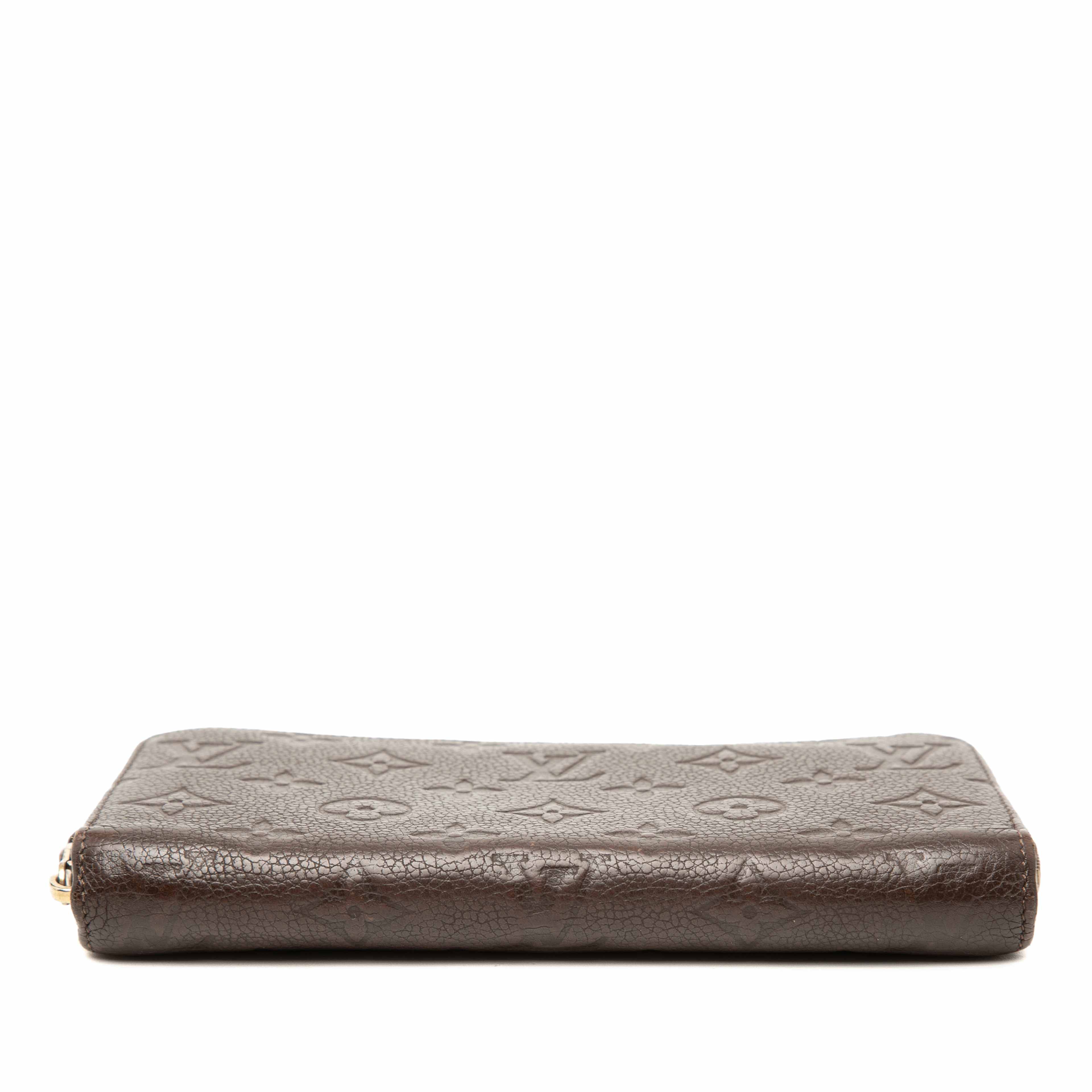 Louis Vuitton Monogram Empreinte Zippy Wallet, från Luxclusif, i färgen brun. Klicka för att öppna bilden i stort format