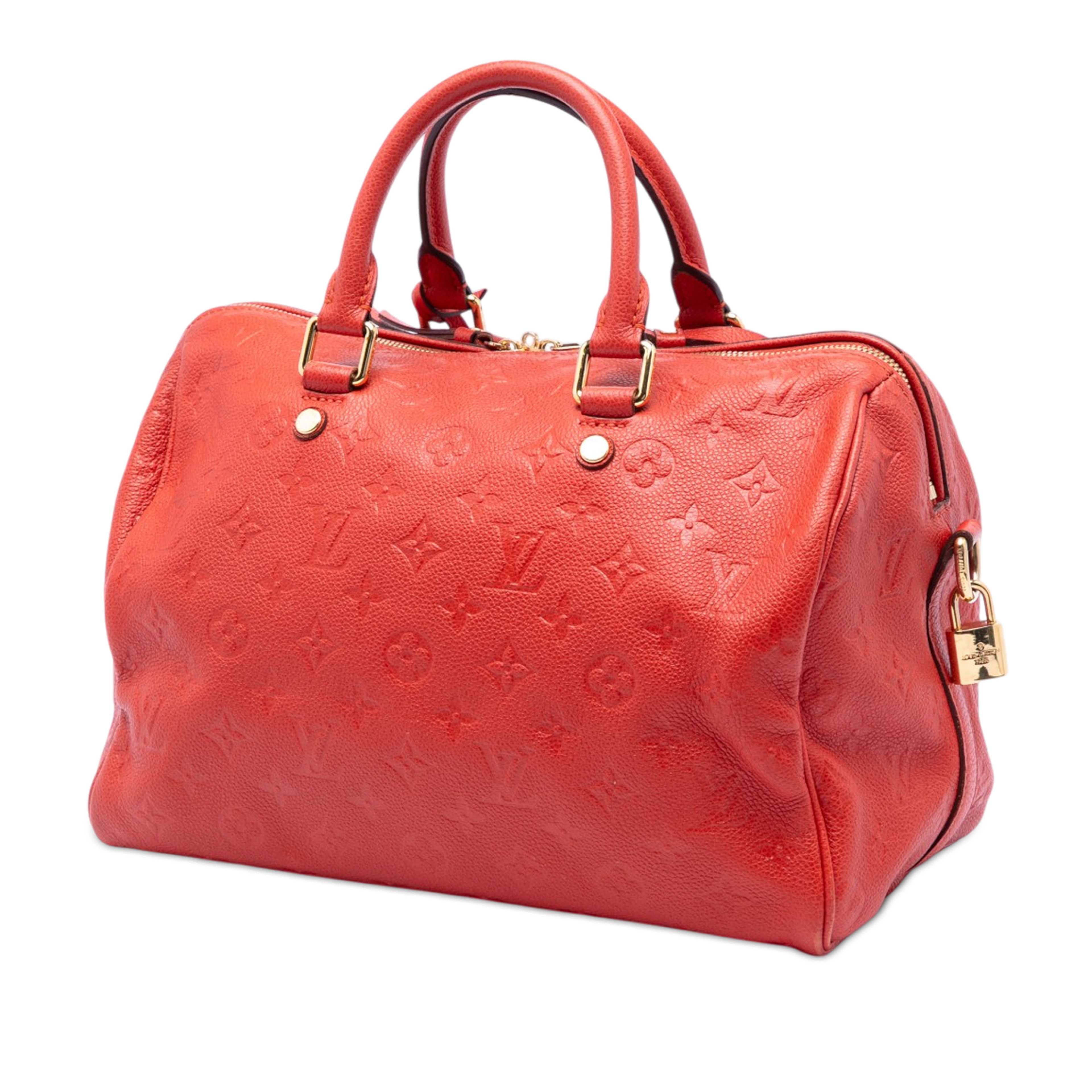 Louis Vuitton Monogram Empreinte Speedy Bandouliere 30, från Luxclusif, i färgen red. Klicka för att öppna bilden i stort format