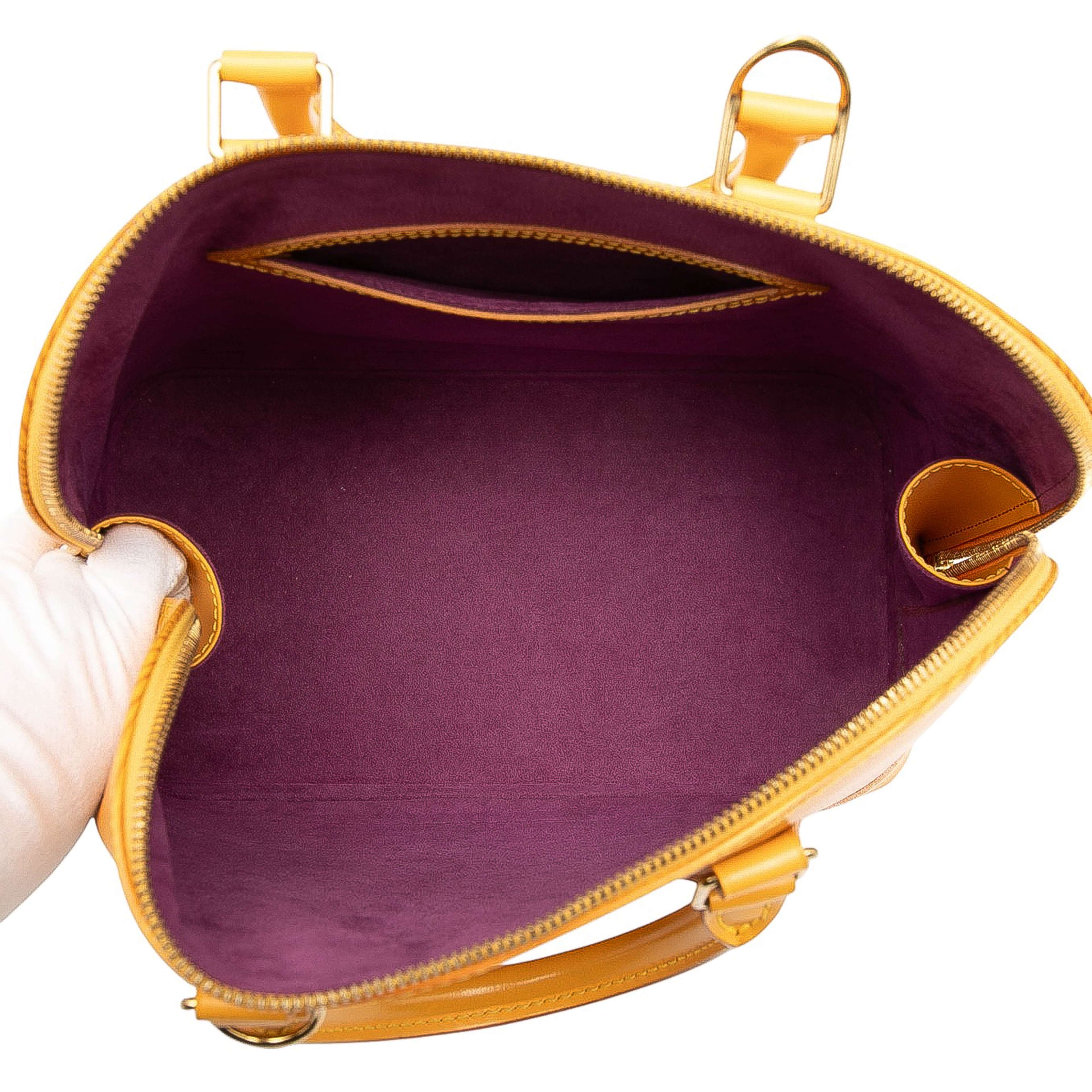 Louis Vuitton Epi Alma Pm, från Luxclusif, i färgen yellow. Klicka för att öppna bilden i stort format