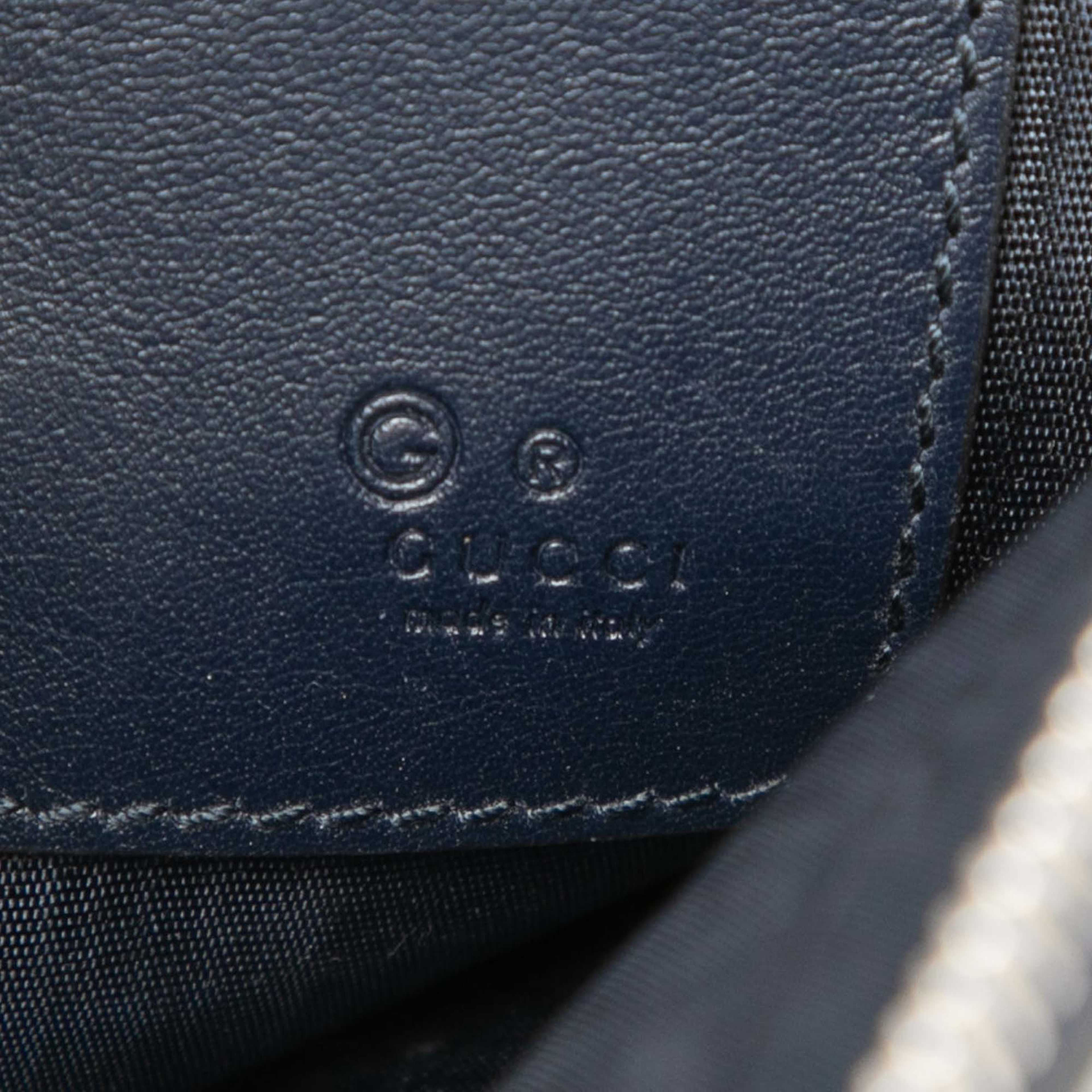 Gucci Microguccissima Clutch, från Luxclusif, i färgen black. Klicka för att öppna bilden i stort format