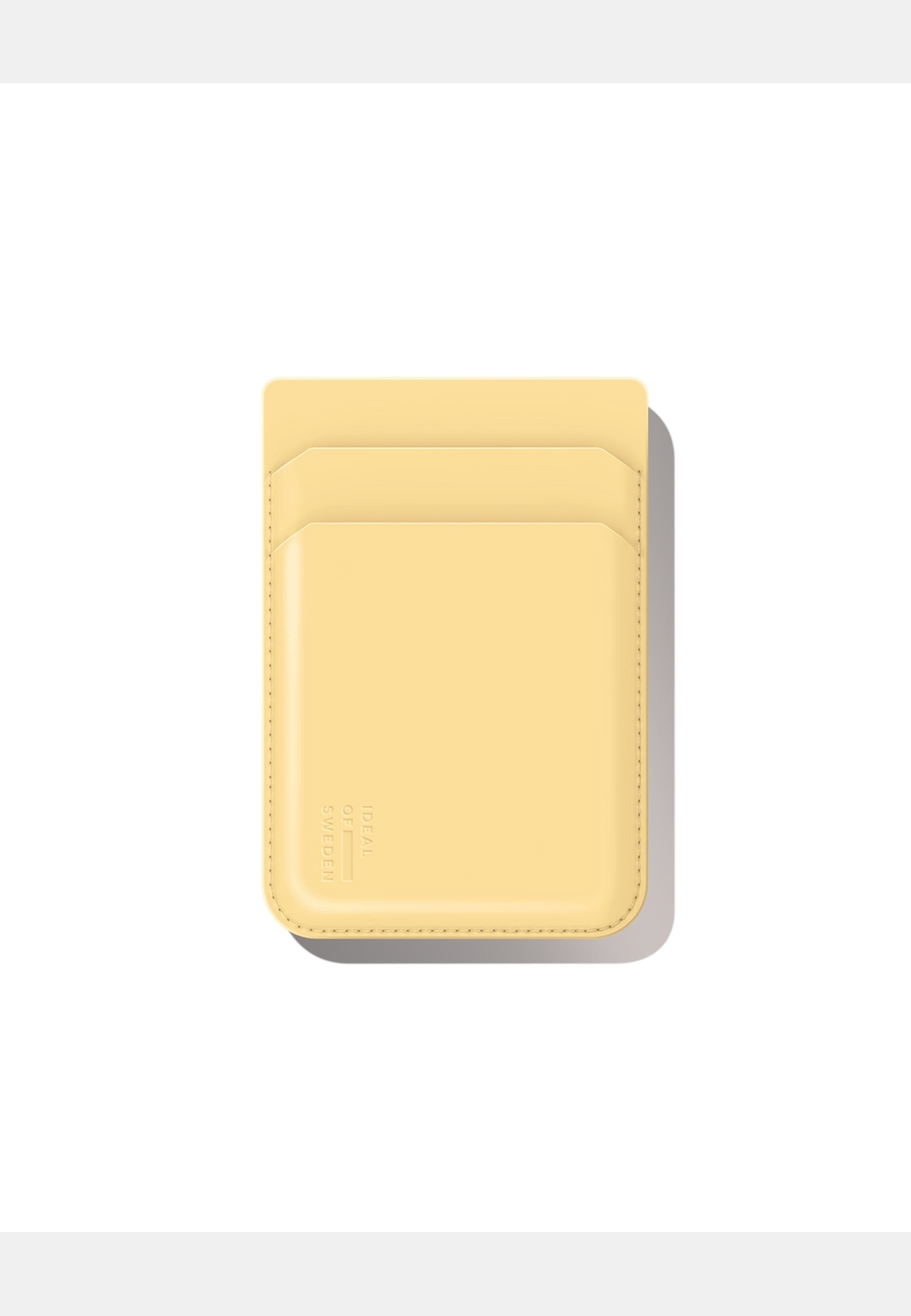 Card Holder Magsafe, från Ideal Of Sweden, i färgen yellow. Klicka för att öppna bilden i stort format