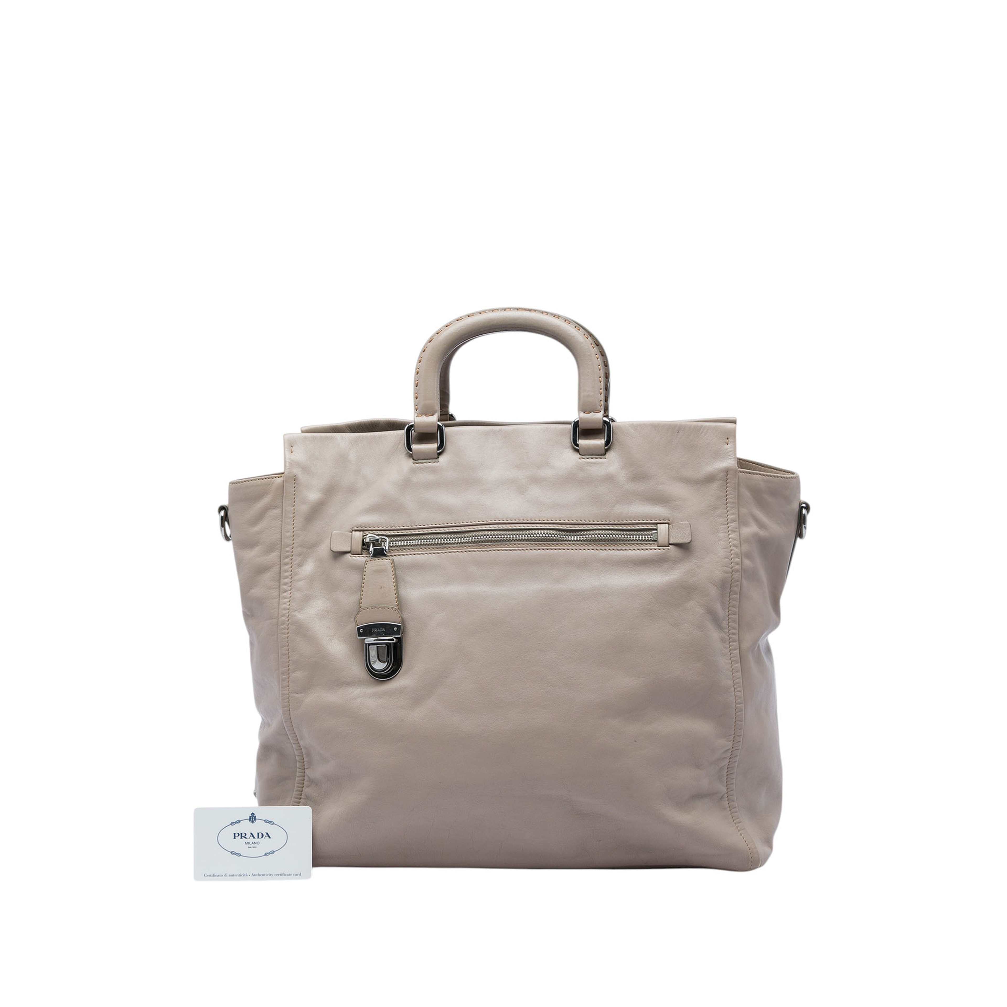 Prada Calfskin Front Pocket Satchel, från Luxclusif, i färgen beige. Klicka för att öppna bilden i stort format