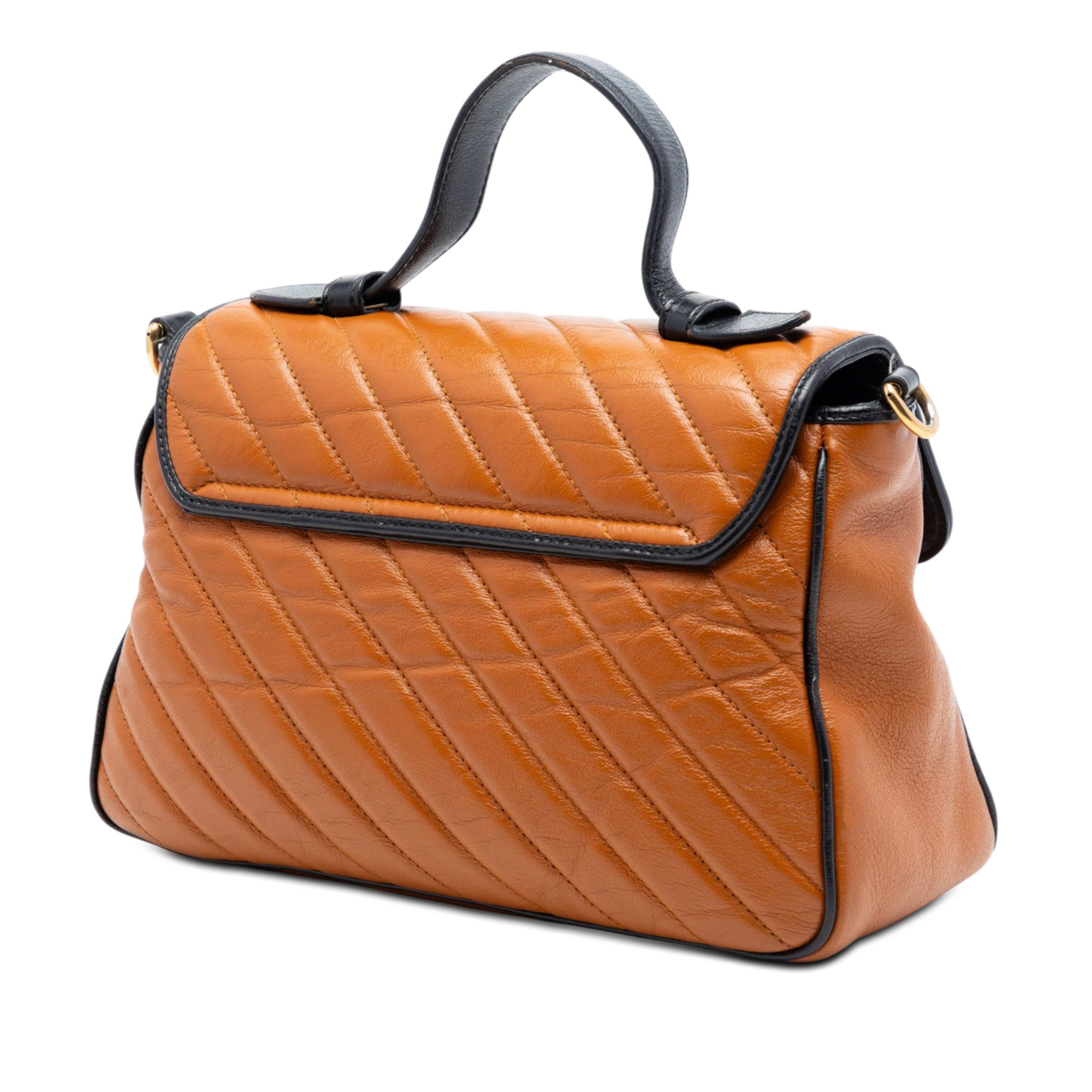 Gucci Small Gg Marmont Matelasse Leather Torchon Top Handle Bag, från Luxclusif, i färgen brun. Klicka för att öppna bilden i stort format