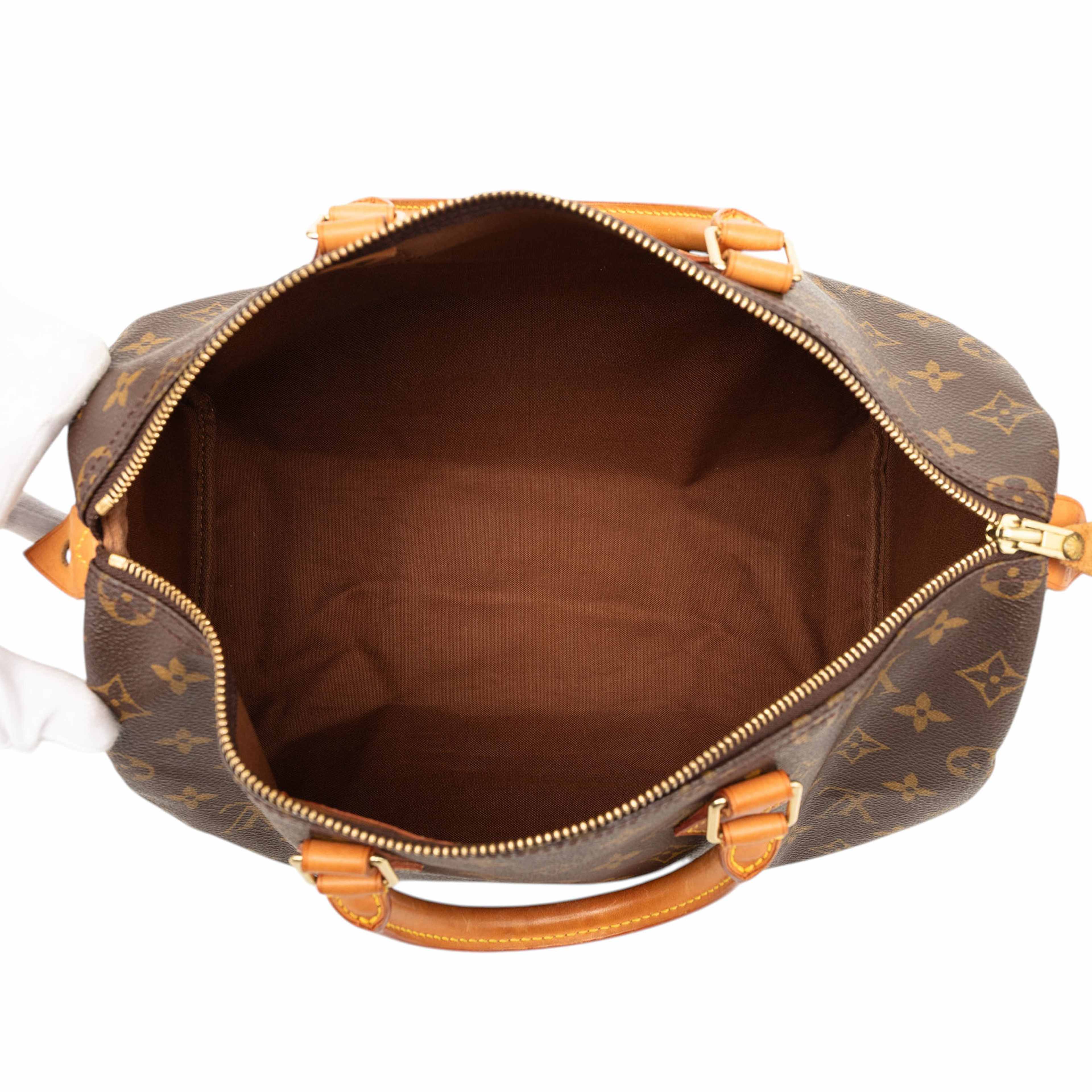 Louis Vuitton Monogram Speedy 35, från Luxclusif, i färgen brown. Klicka för att öppna bilden i stort format