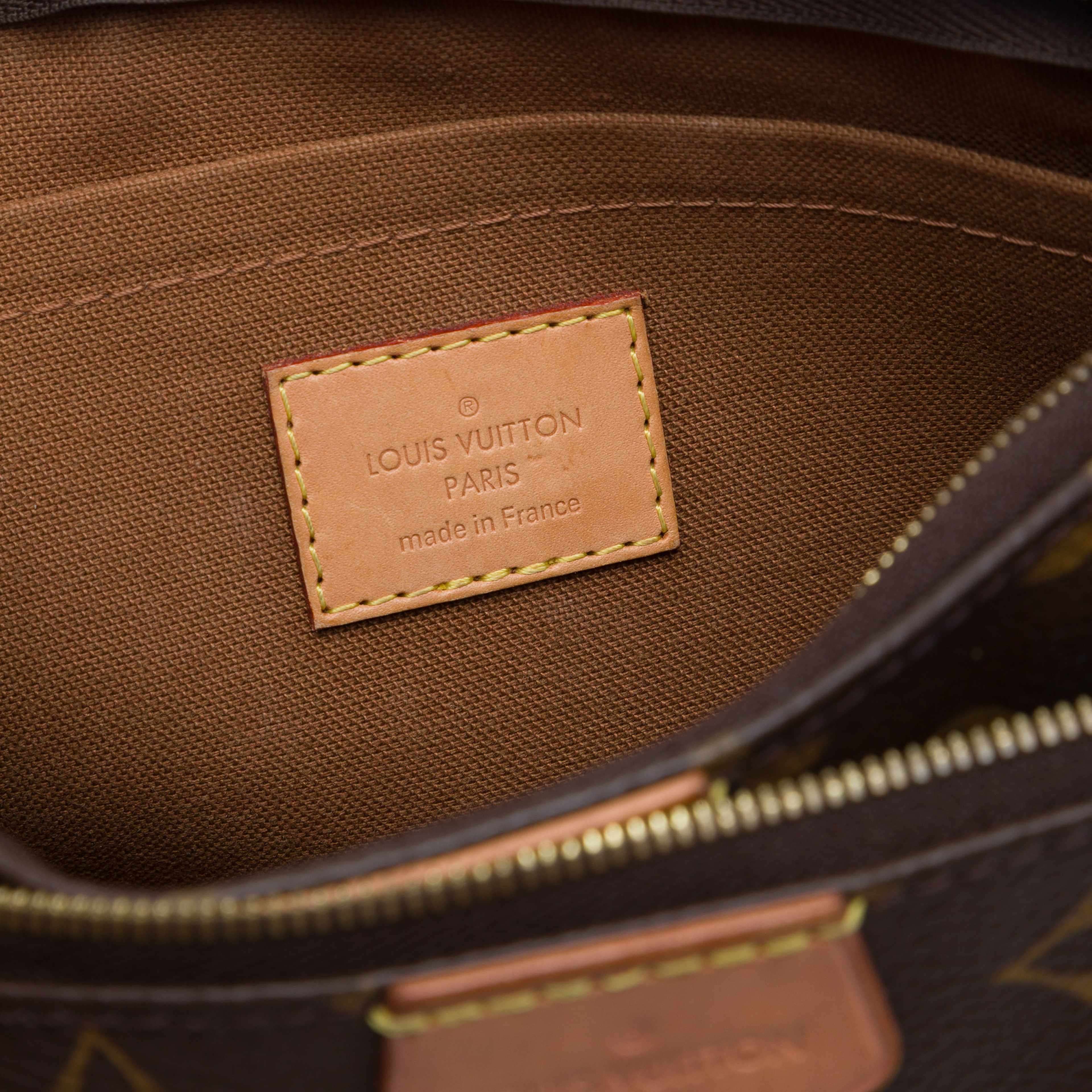 Louis Vuitton Monogram Multi Pochette Accessoires, från Luxclusif, i färgen brun. Klicka för att öppna bilden i stort format