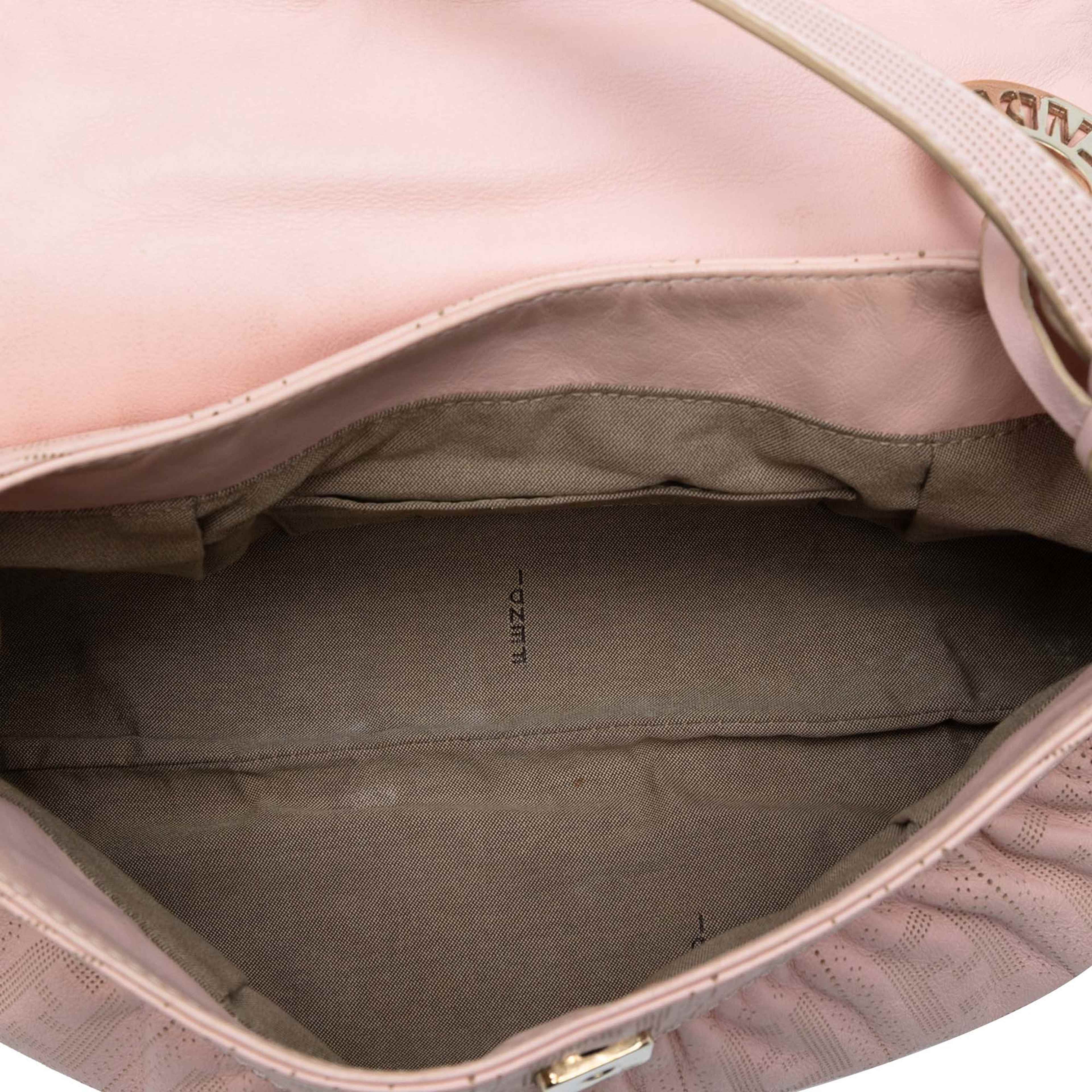 Fendi Small Zucca Perforated Leather Chef Flap, från Luxclusif, i färgen pink. Klicka för att öppna bilden i stort format