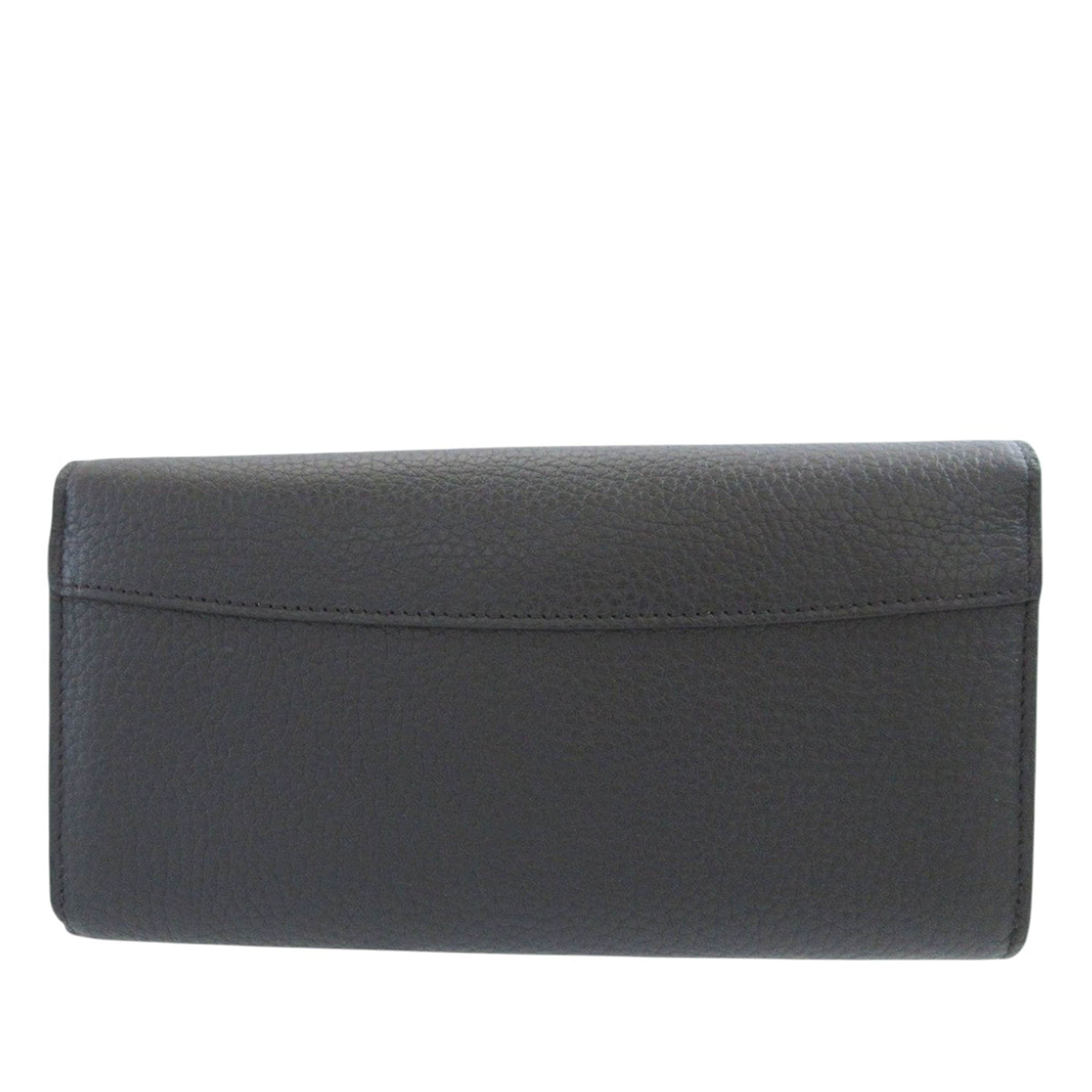 Louis Vuitton Taurillon Capucines Flower Long Wallet, från Luxclusif, i färgen svart. Klicka för att öppna bilden i stort format