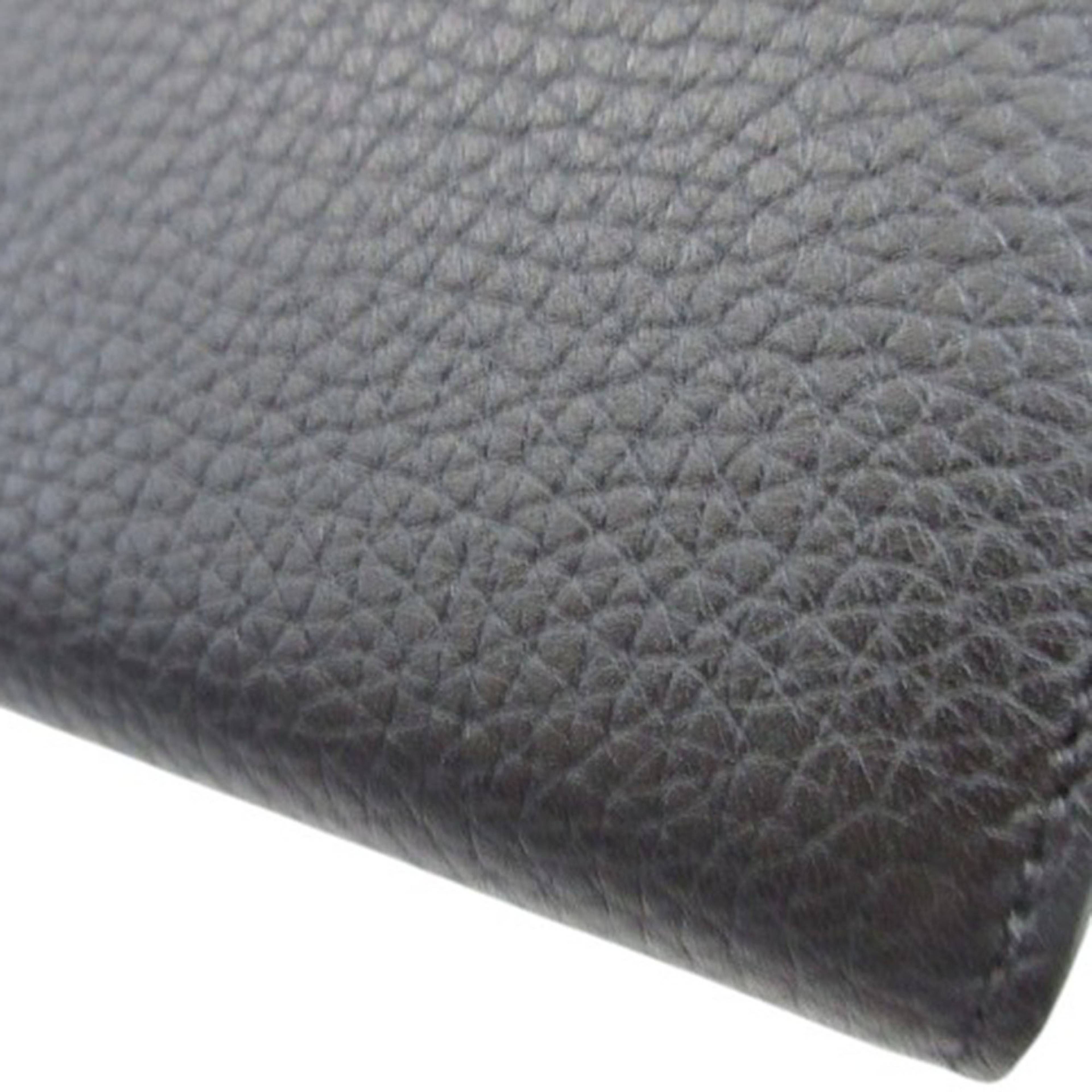 Louis Vuitton Taurillon Capucines Flower Long Wallet, från Luxclusif, i färgen svart. Klicka för att öppna bilden i stort format