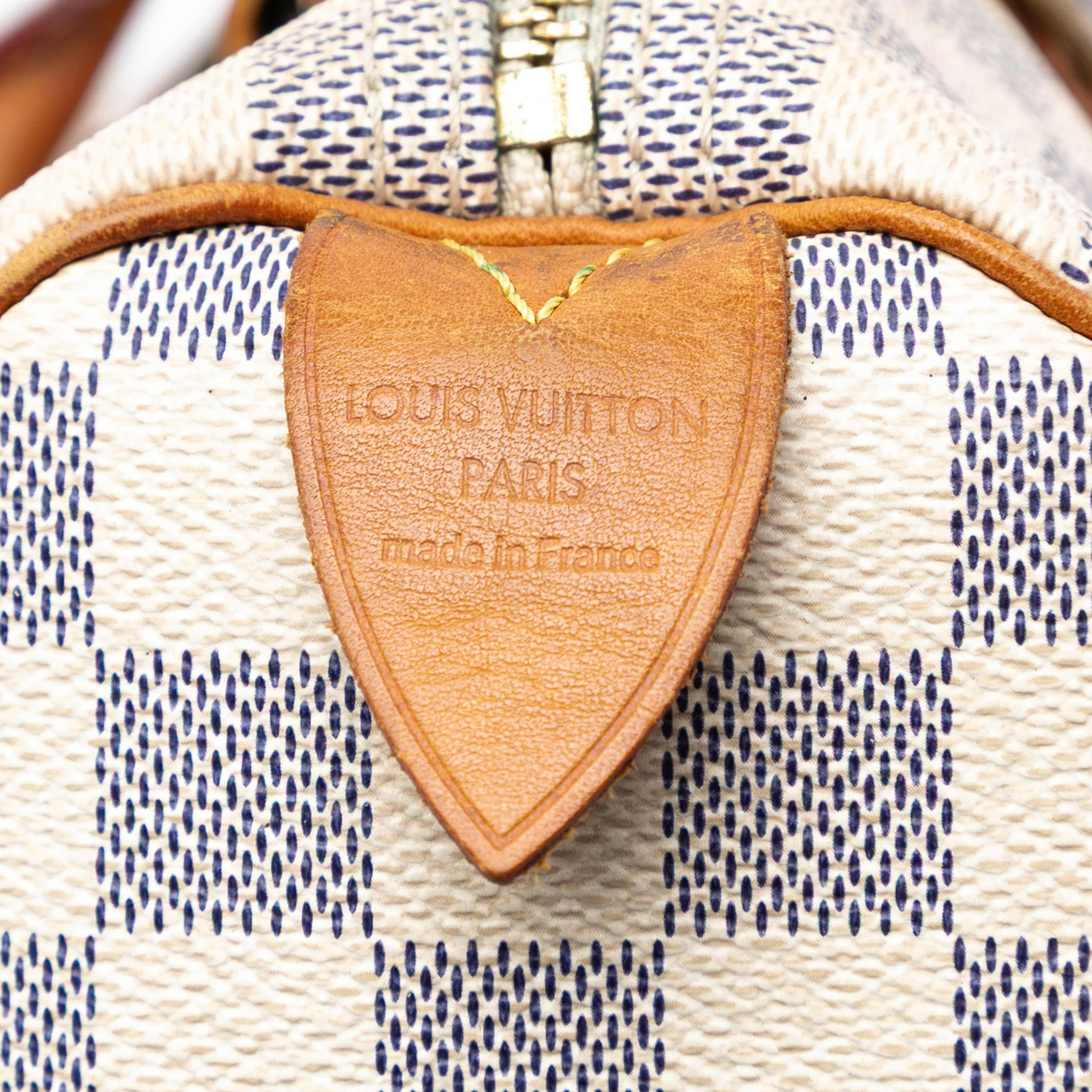 Louis Vuitton Damier Azur Speedy 30, från Luxclusif, i färgen white. Klicka för att öppna bilden i stort format