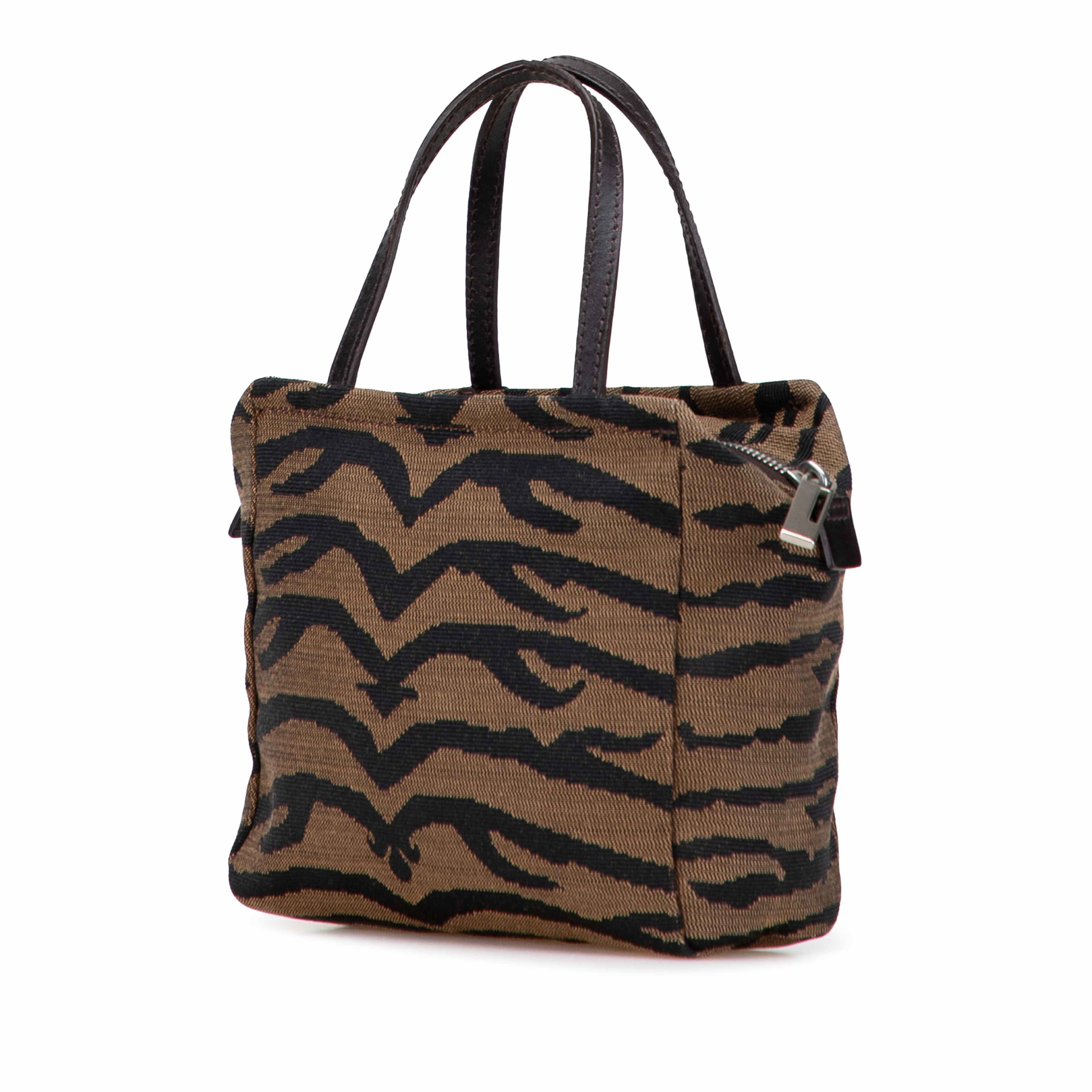 Fendi Zebra Print Canvas Handbag, från Luxclusif, i färgen brown. Klicka för att öppna bilden i stort format