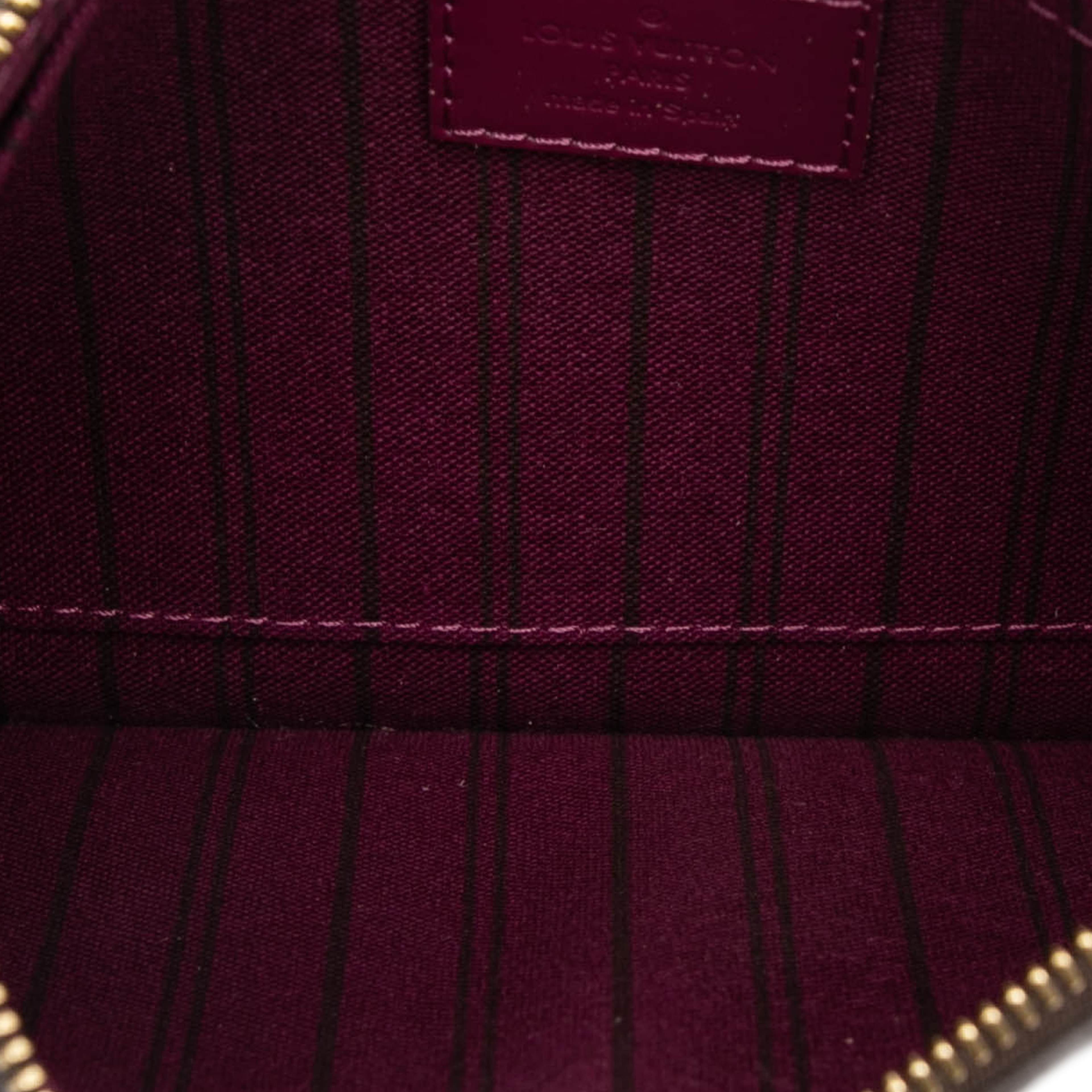 Louis Vuitton Monogram Neverfull Pouch Mm, från Luxclusif, i färgen brown. Klicka för att öppna bilden i stort format