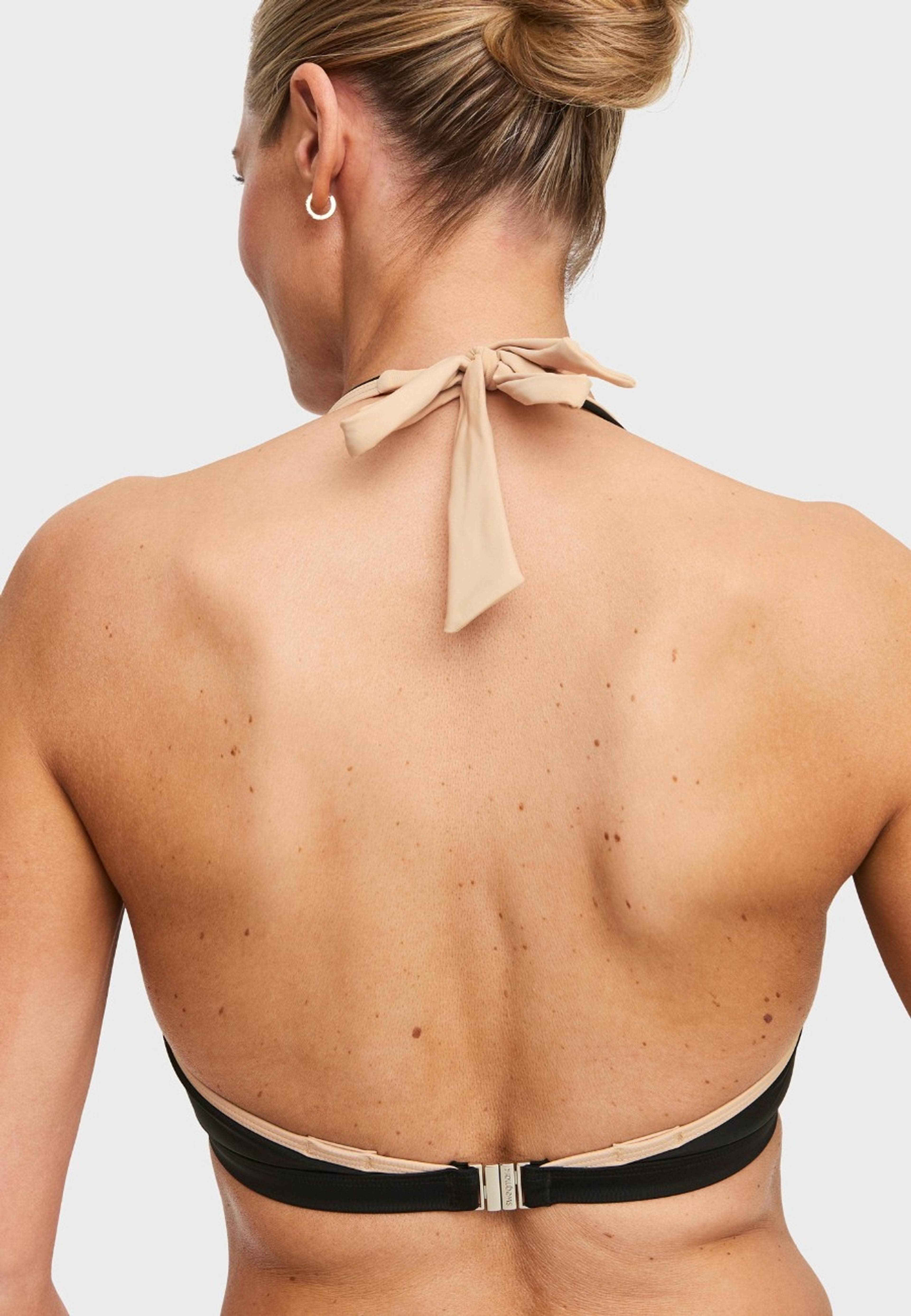 Maui Halterneck Bikini-bh, från Swegmark, i färgen black/beige. Klicka för att öppna bilden i stort format