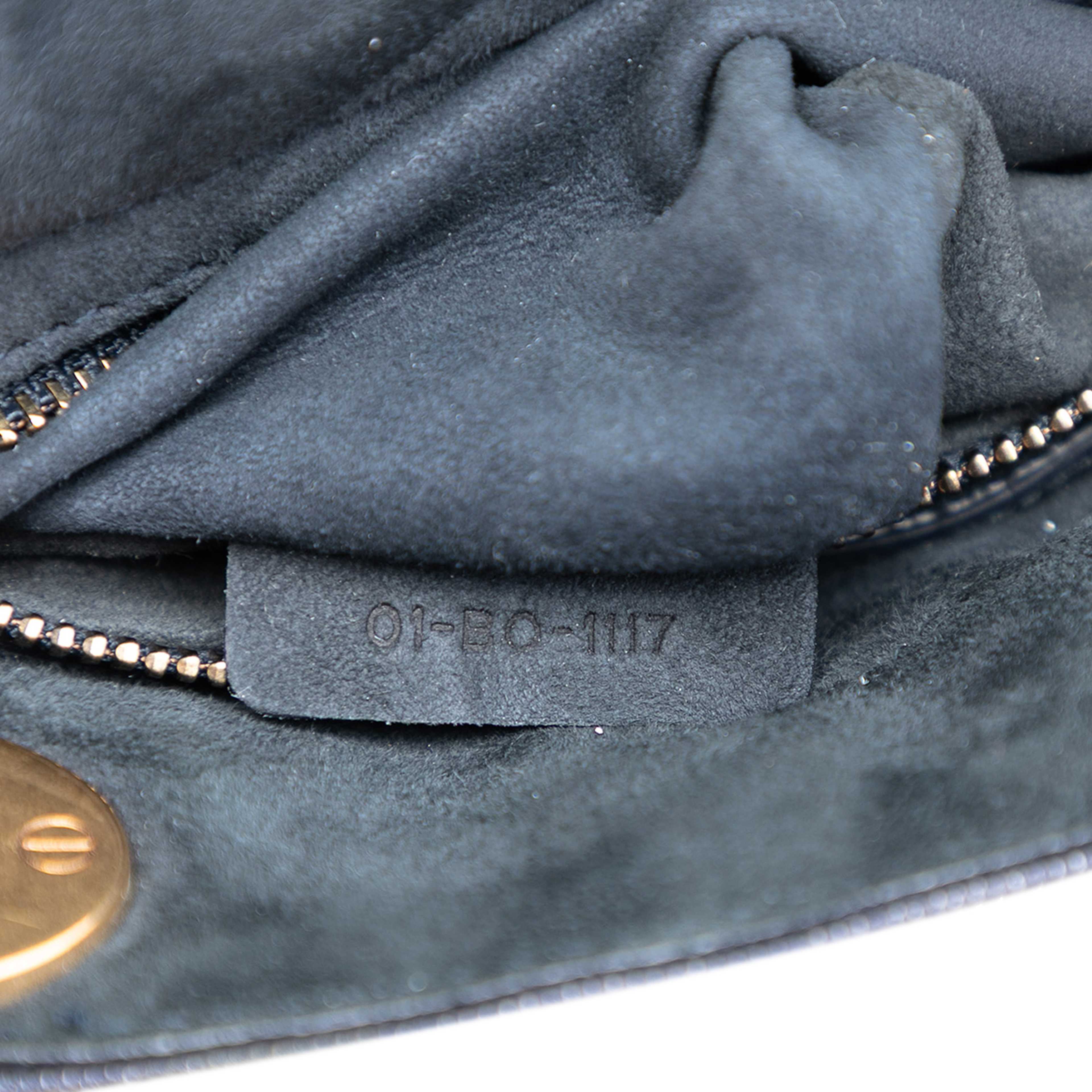 Dior Mini Denim Cannage Studded Supple Lady Dior, från Luxclusif, i färgen navy. Klicka för att öppna bilden i stort format