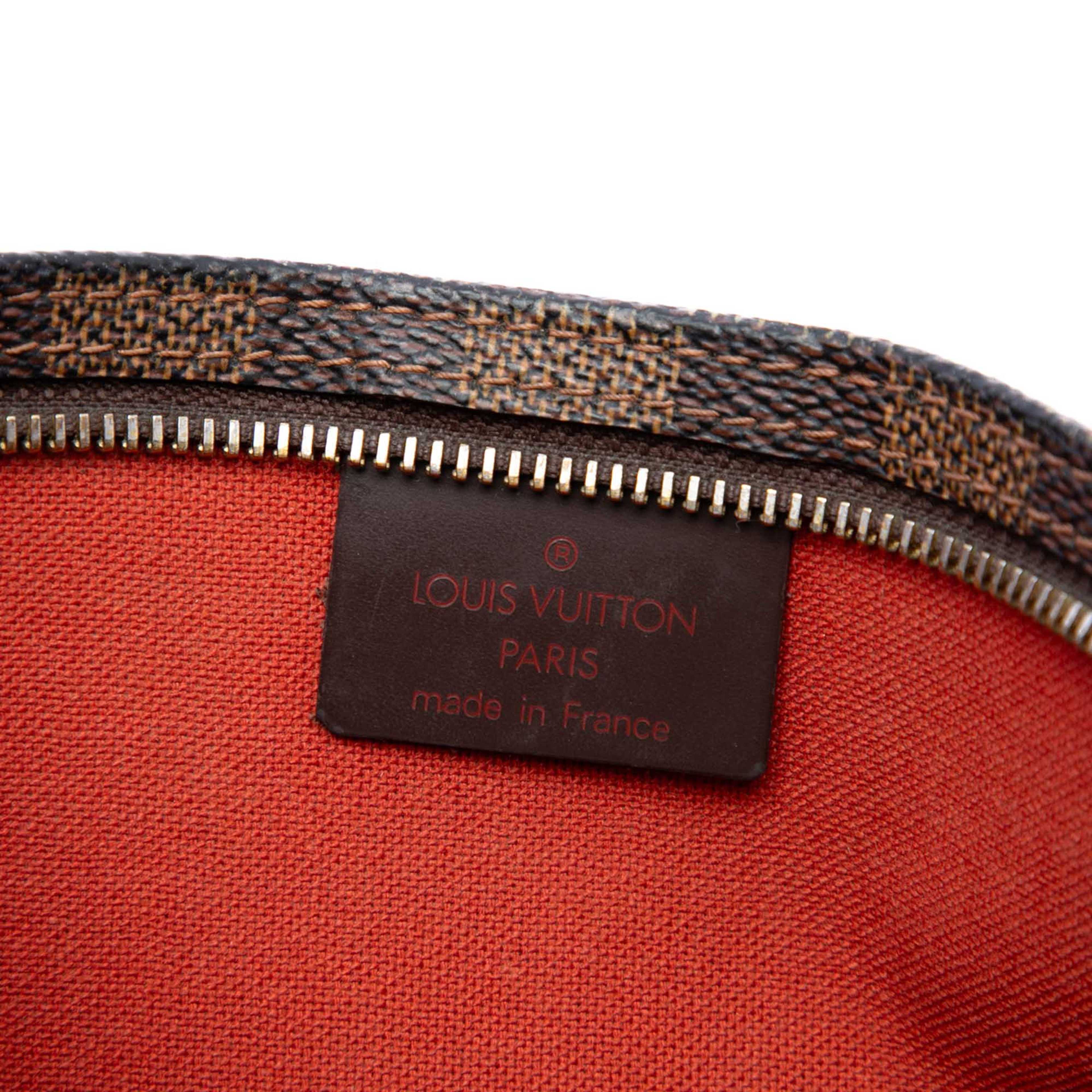 Louis Vuitton Damier Ebene Navona, från Luxclusif, i färgen brun. Klicka för att öppna bilden i stort format