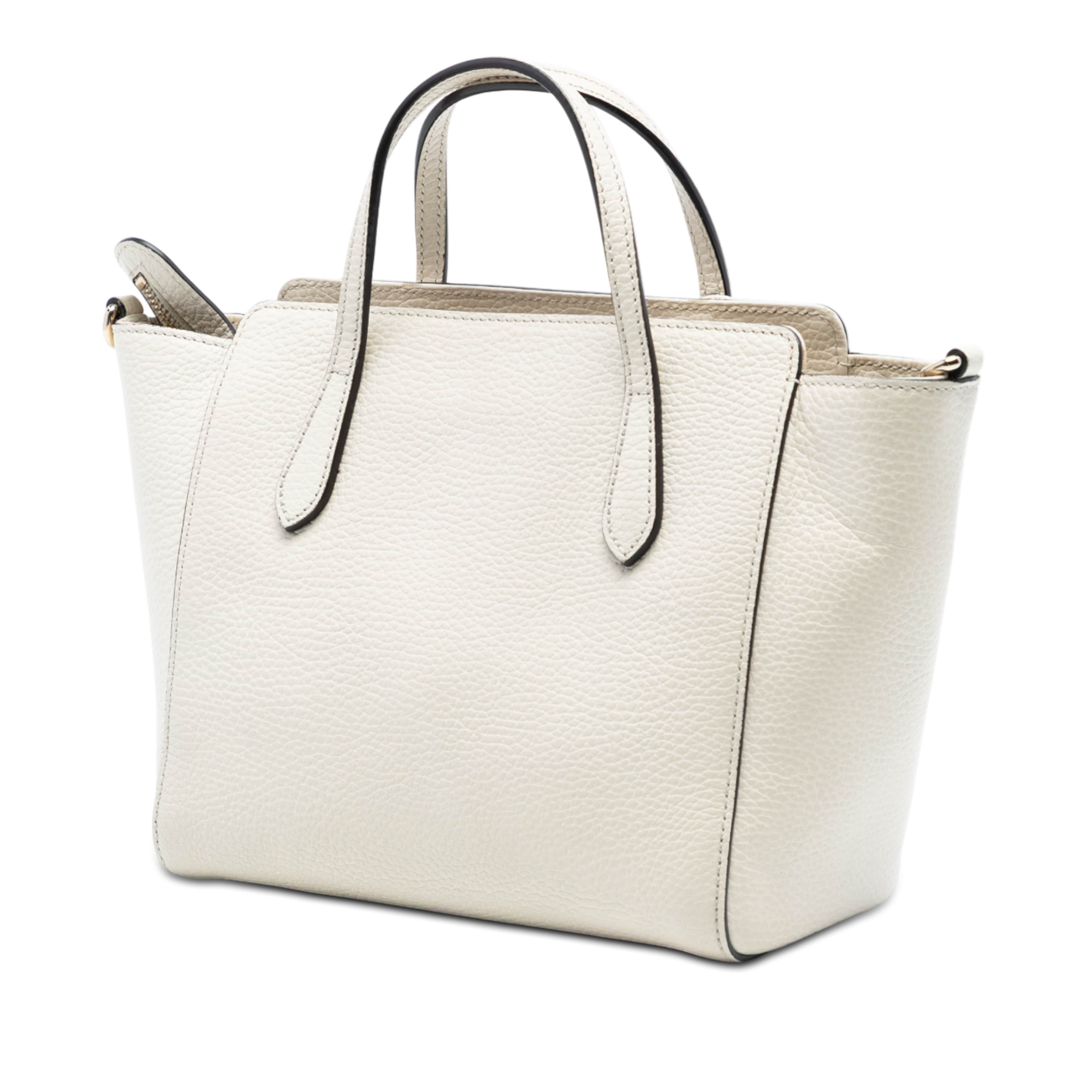 Gucci Mini Leather Swing Satchel, från Luxclusif, i färgen off white. Klicka för att öppna bilden i stort format