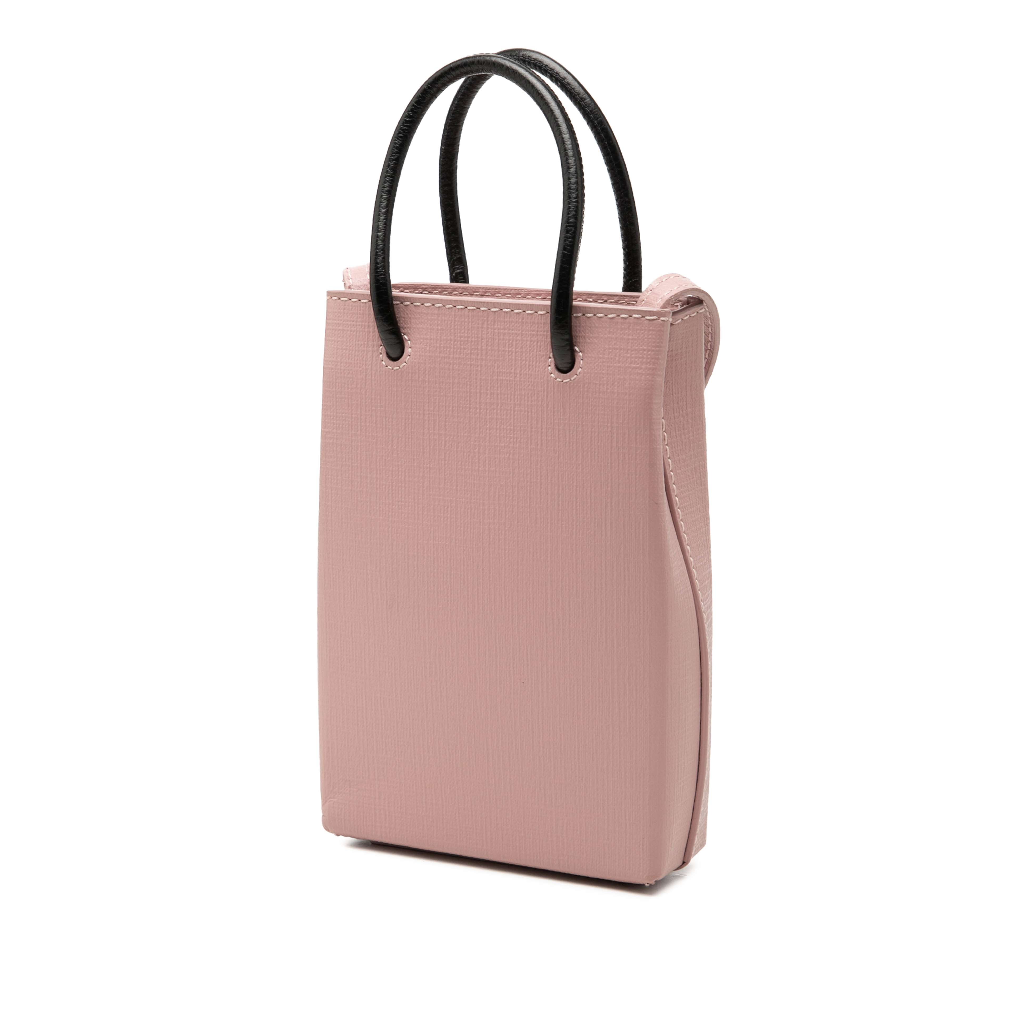 Balenciaga Mini Calfskin Logo Shopping Phone Holder, från Luxclusif, i färgen rosa. Klicka för att öppna bilden i stort format