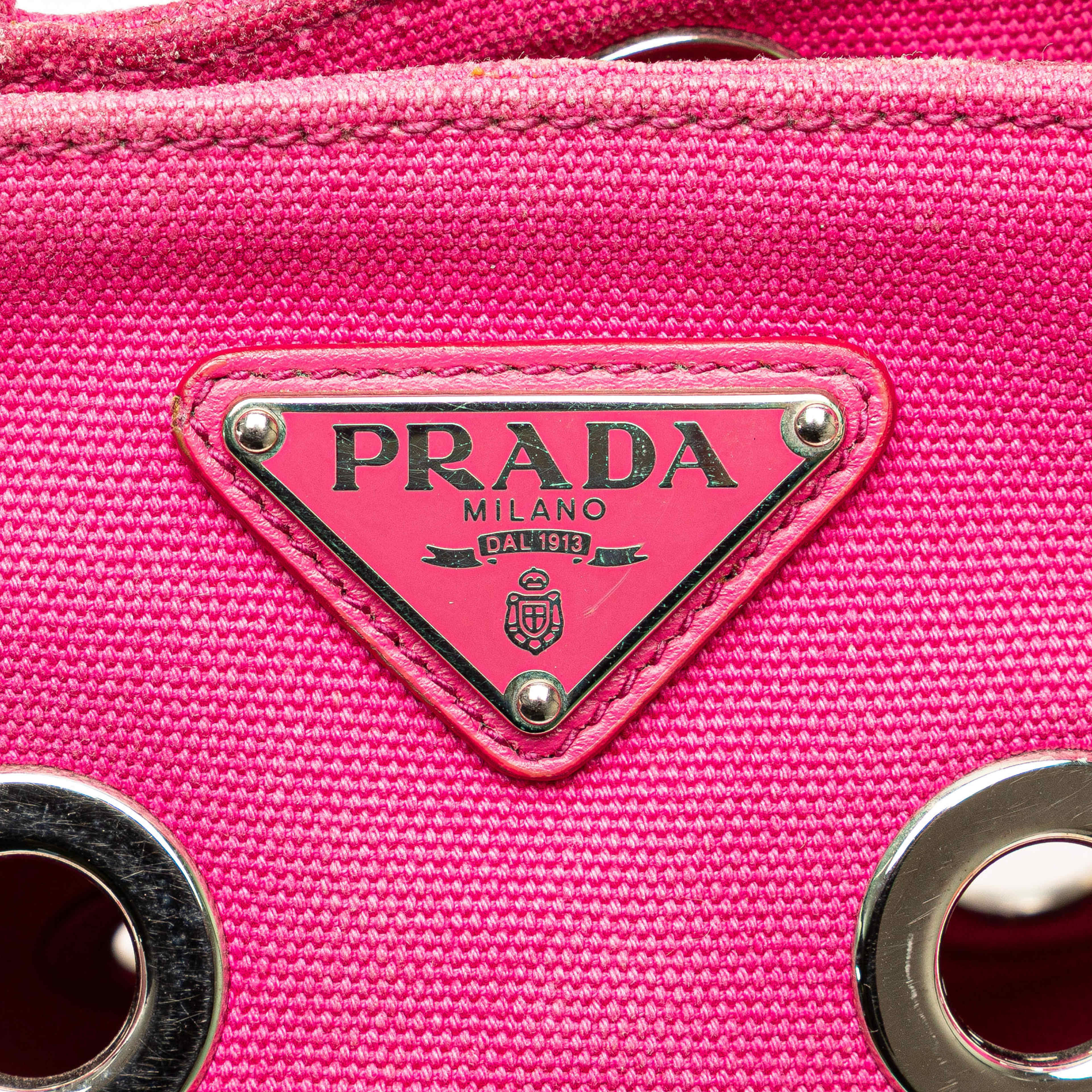 Prada Small Canvas Canapa Grommet Satchel, från Luxclusif, i färgen pink. Klicka för att öppna bilden i stort format