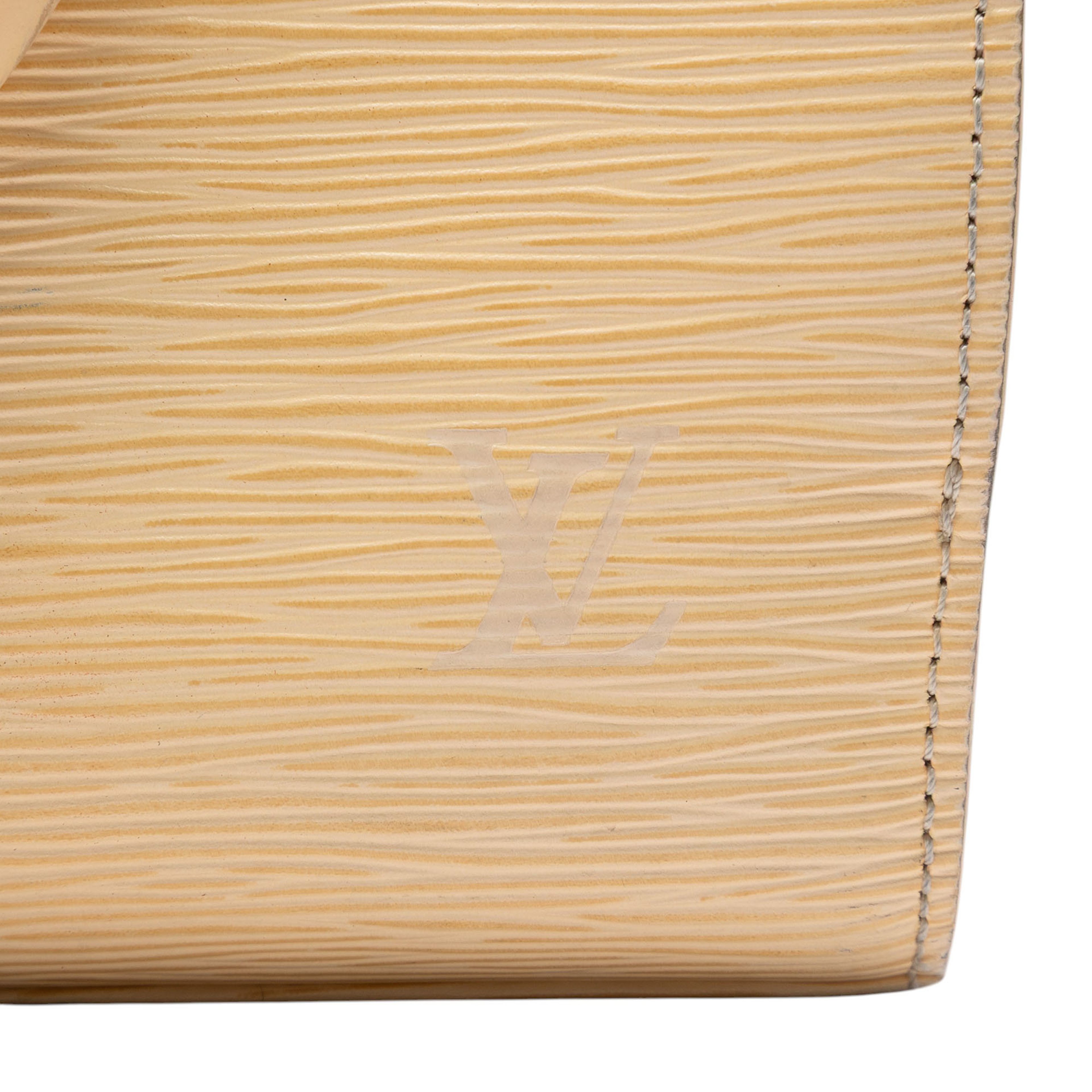 Louis Vuitton Epi Pont Neuf Pm, från Luxclusif, i färgen beige. Klicka för att öppna bilden i stort format
