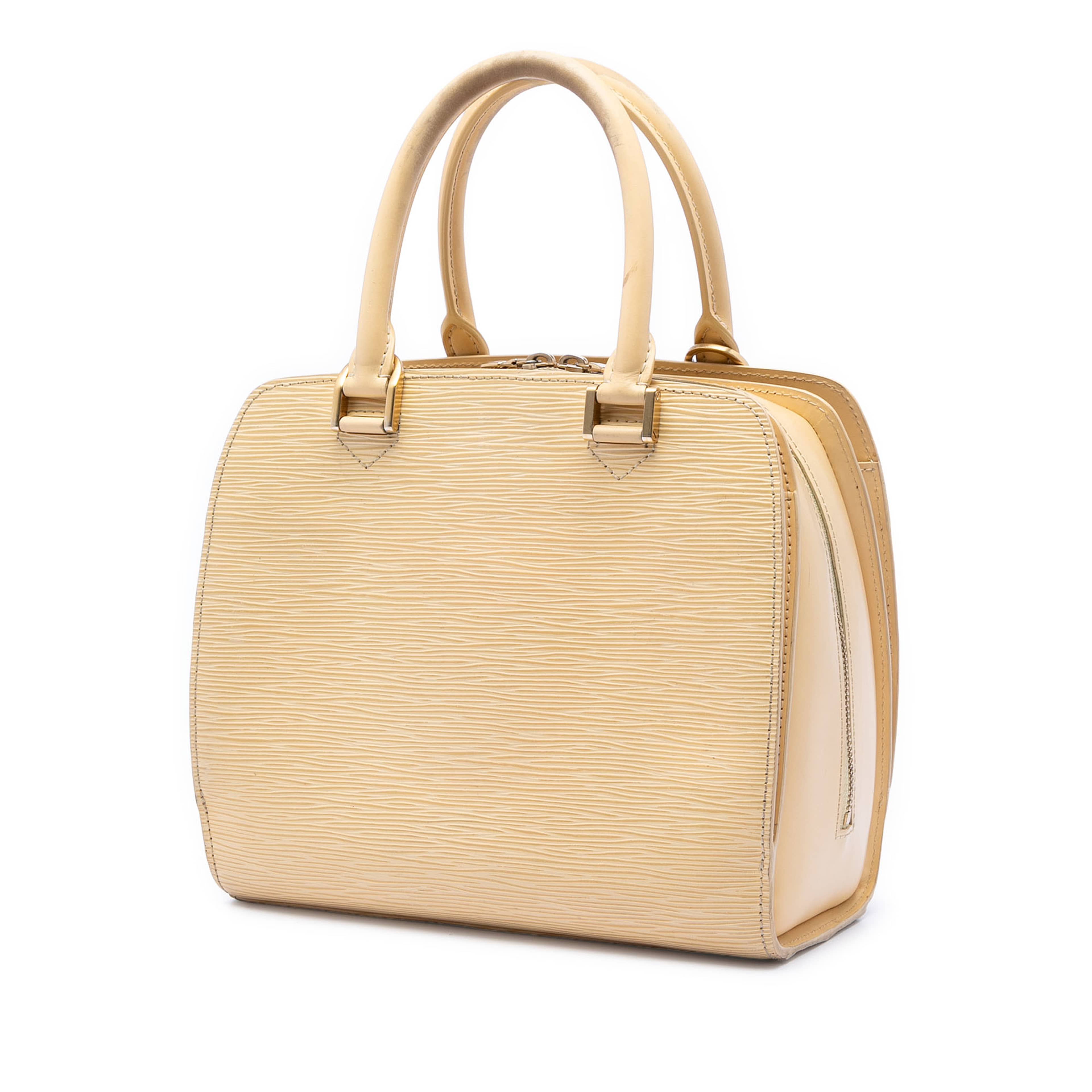 Louis Vuitton Epi Pont Neuf Pm, från Luxclusif, i färgen beige. Klicka för att öppna bilden i stort format