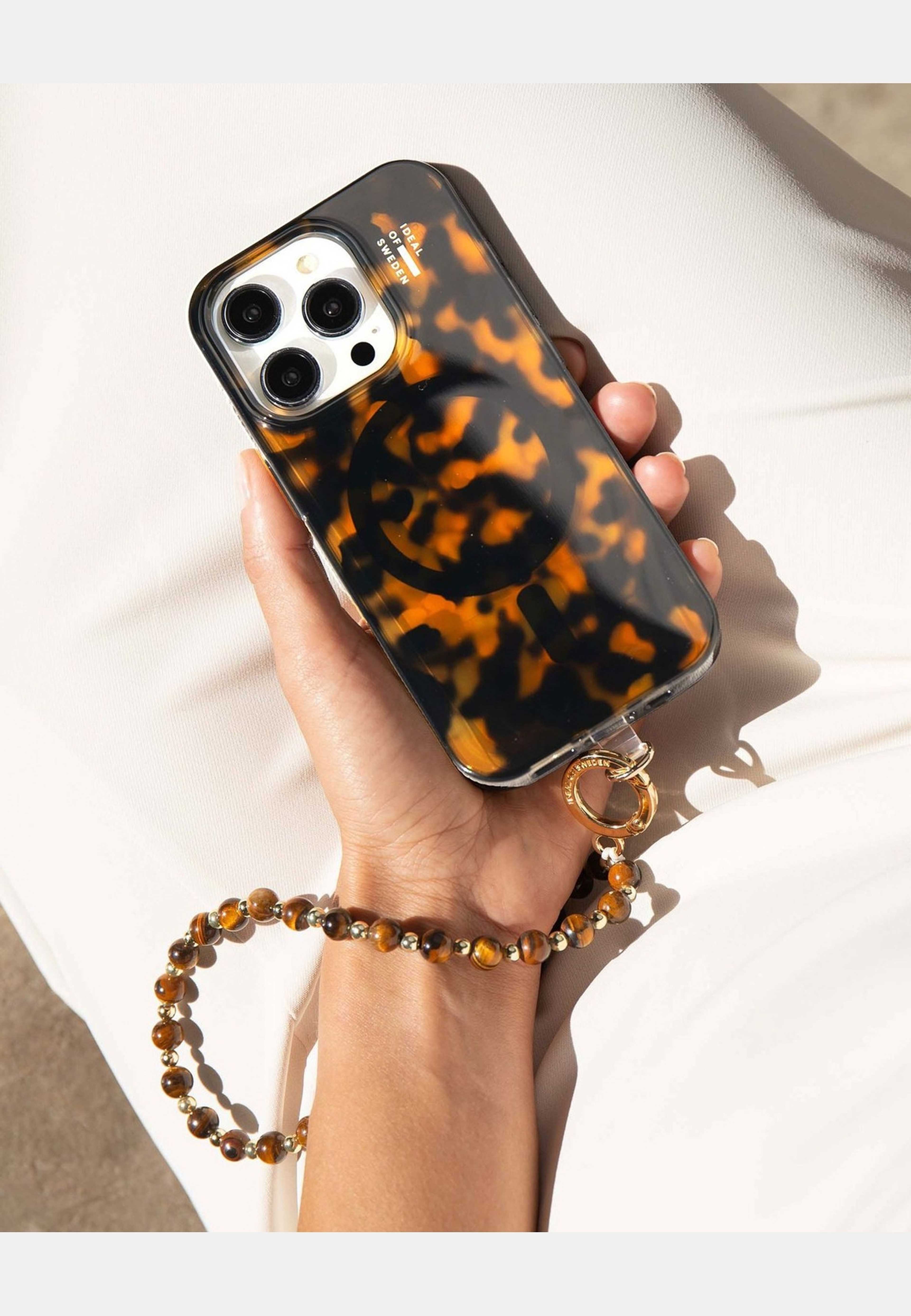 Clear Case Iphone, från Ideal Of Sweden, i färgen brown. Klicka för att öppna bilden i stort format