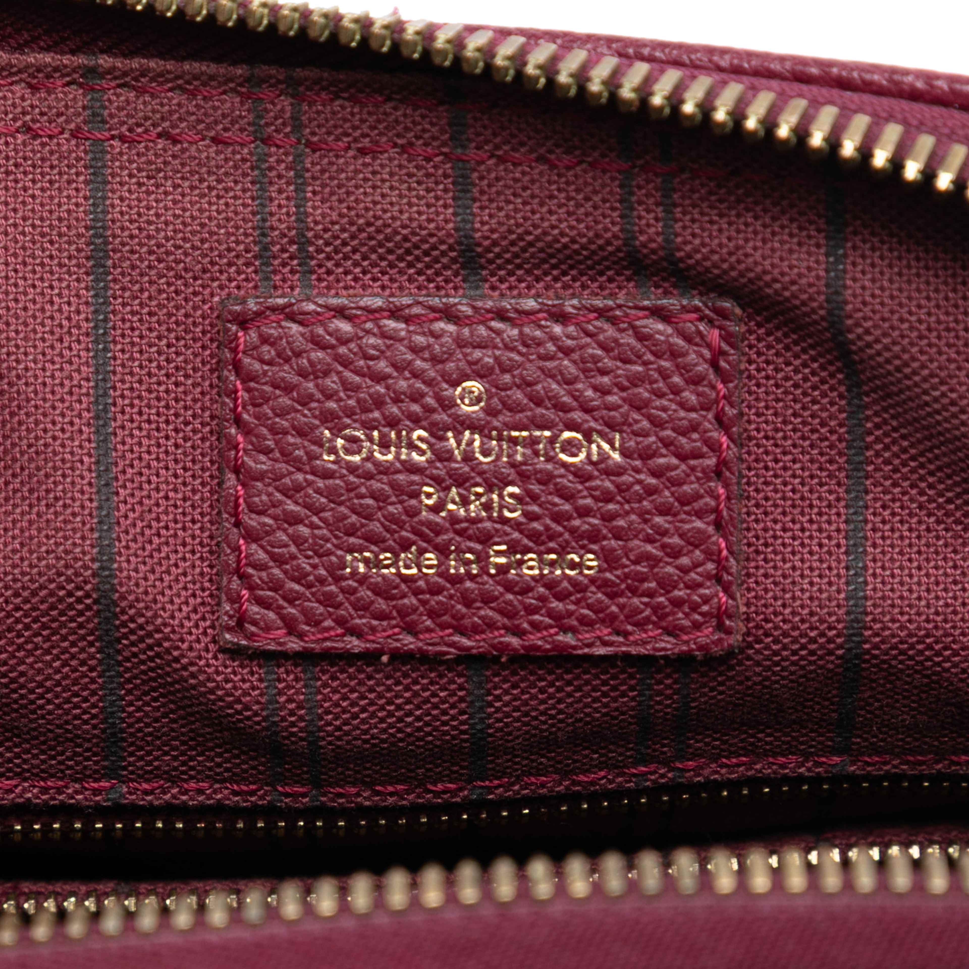 Louis Vuitton Monogram Empreinte Speedy Bandouliere 25, från Luxclusif, i färgen burgundy. Klicka för att öppna bilden i stort format