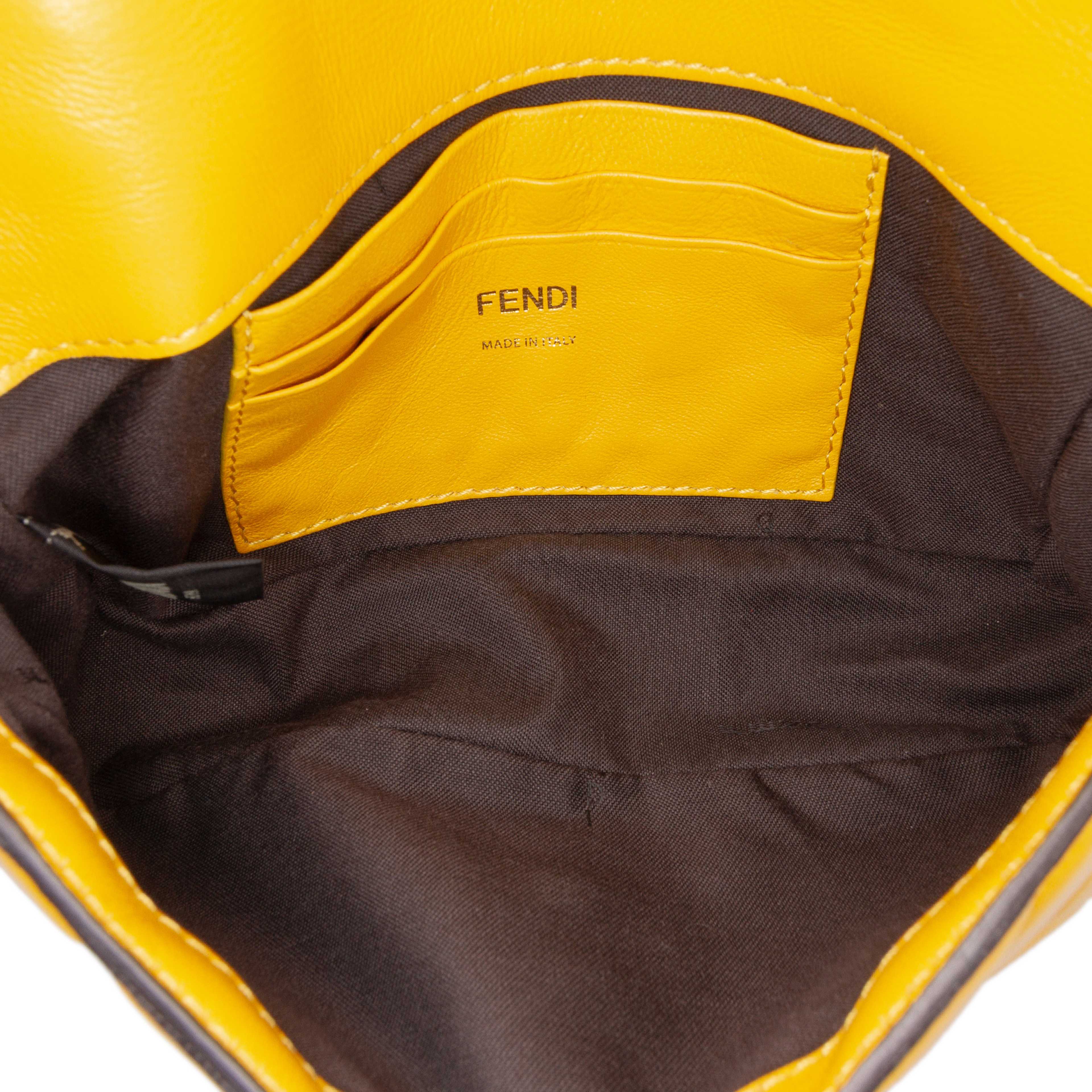 Fendi Mini Zucca Embossed Leather Baguette Satchel, från Luxclusif, i färgen mustard. Klicka för att öppna bilden i stort format