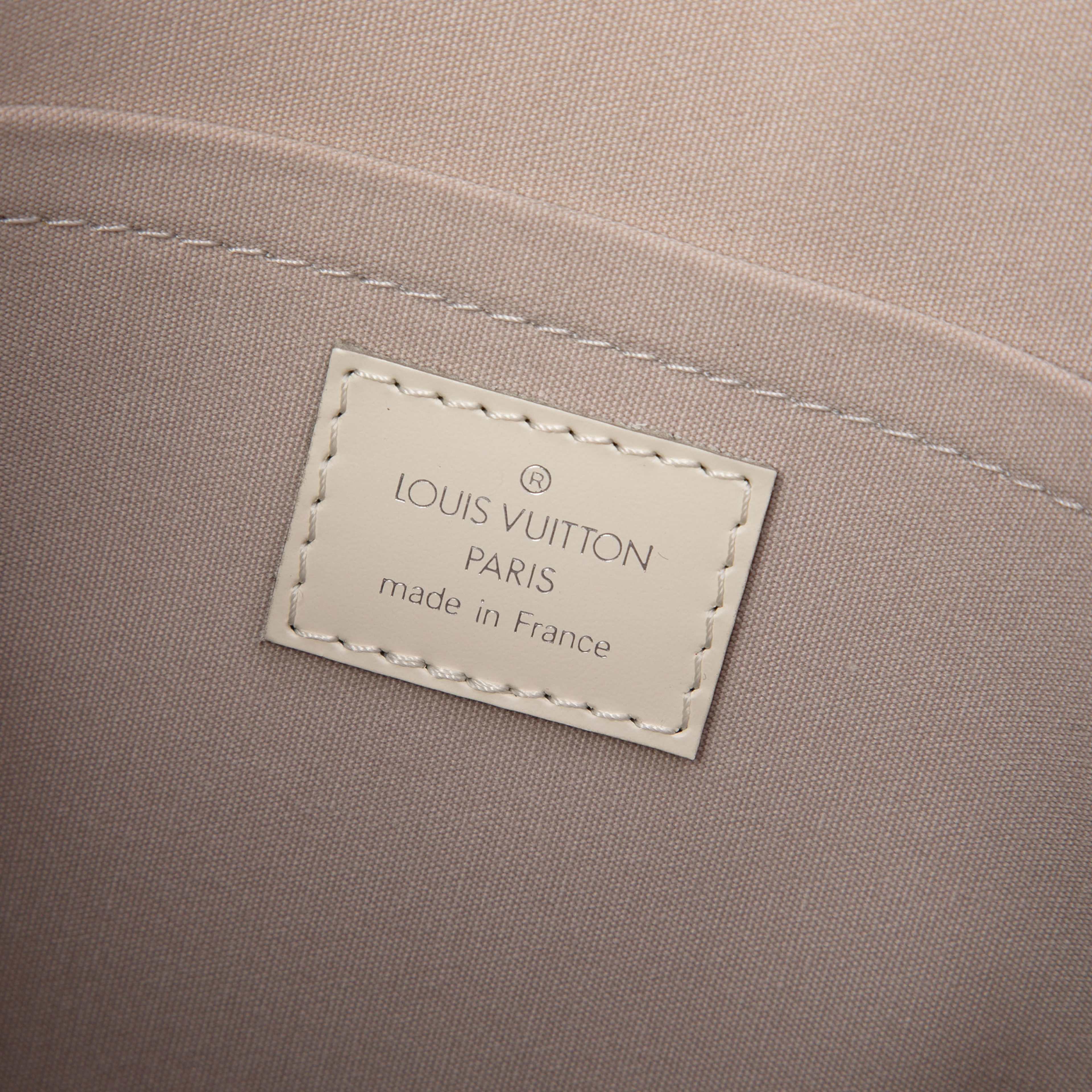 Louis Vuitton Epi Madeleine Gm, från Luxclusif, i färgen vit. Klicka för att öppna bilden i stort format