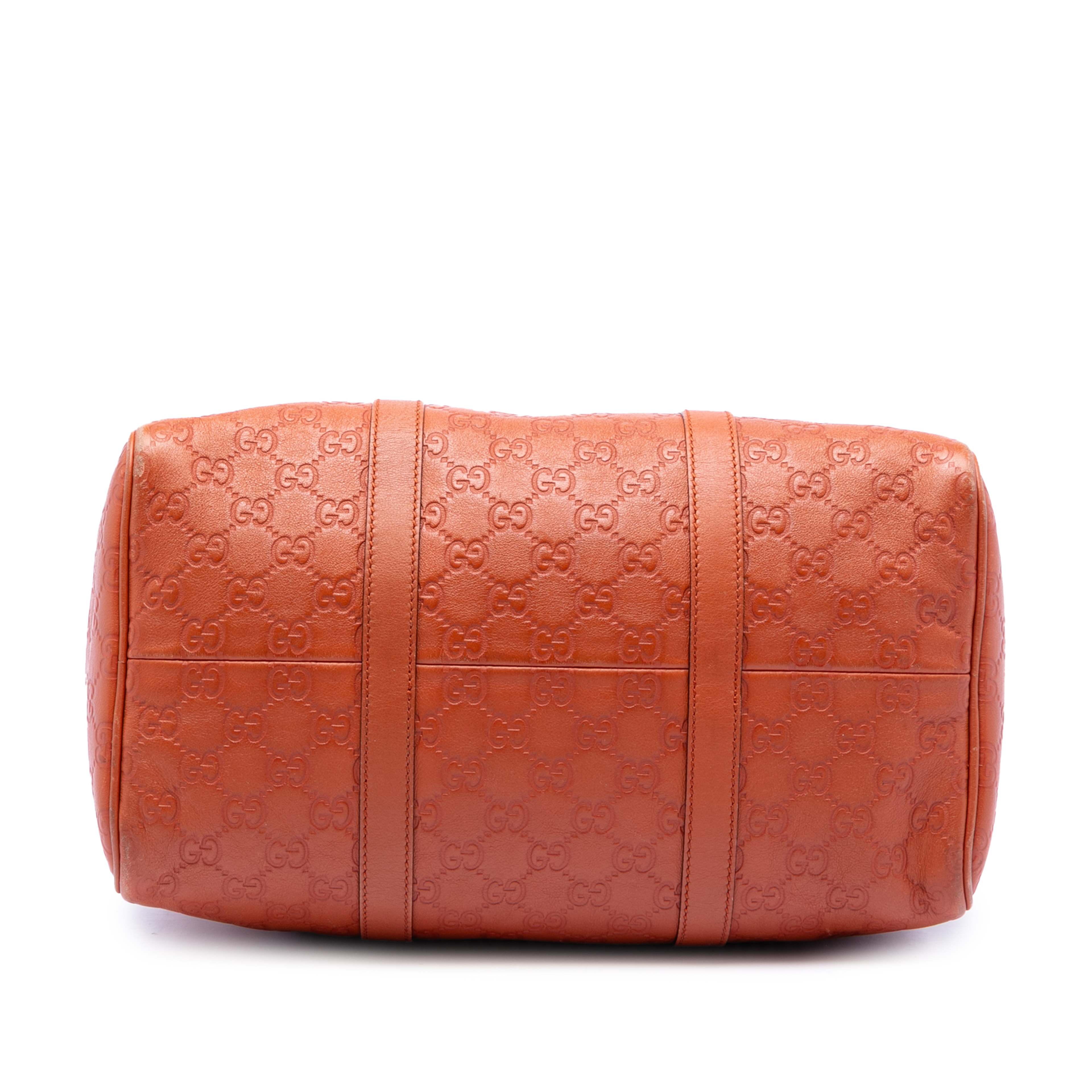 Gucci Medium Guccissima Joy Boston Bag, från Luxclusif, i färgen orange. Klicka för att öppna bilden i stort format