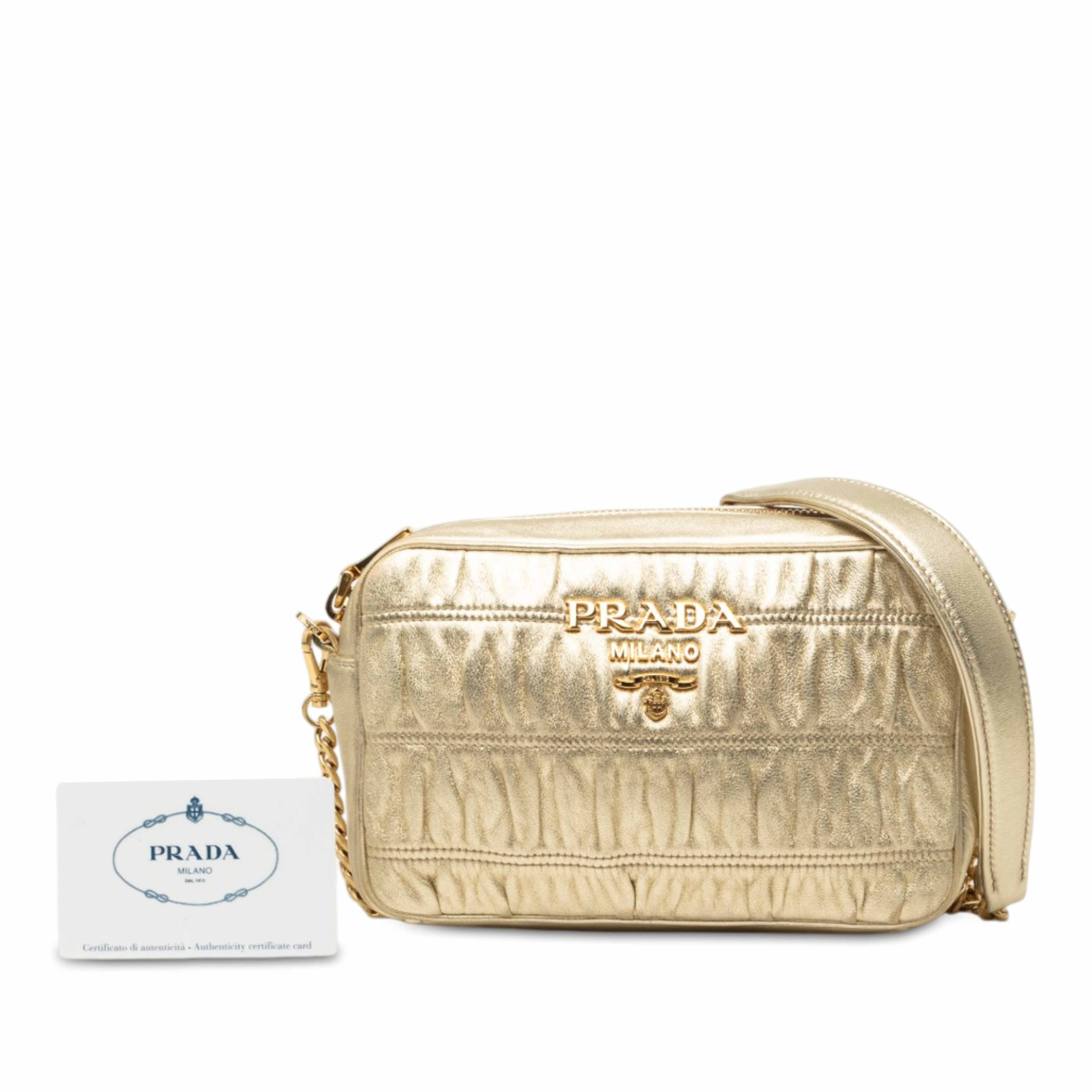 Prada Nappa Gaufre Camera Bag, från Luxclusif, i färgen guld. Klicka för att öppna bilden i stort format