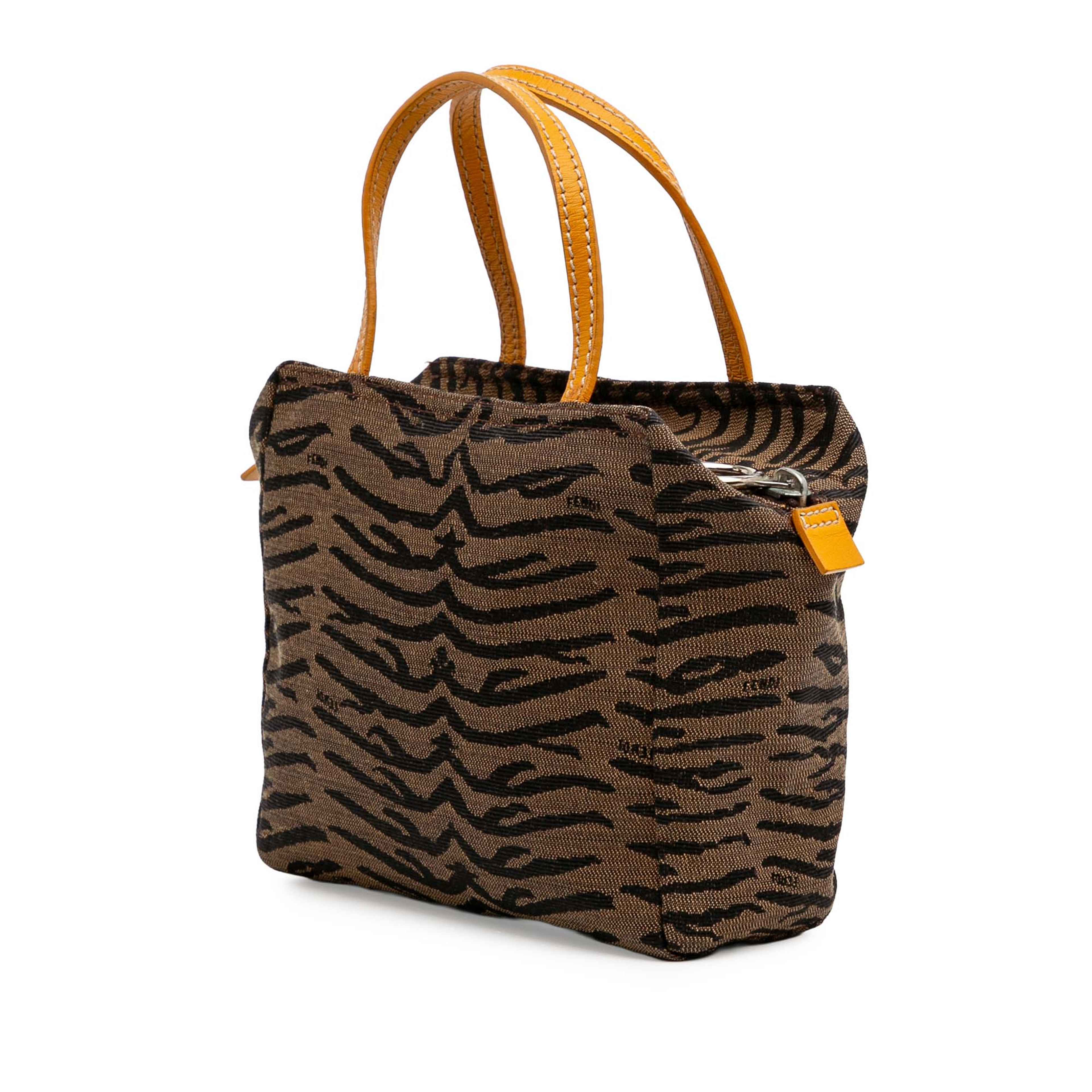Fendi Zebra Print Canvas Handbag, från Luxclusif, i färgen brown. Klicka för att öppna bilden i stort format