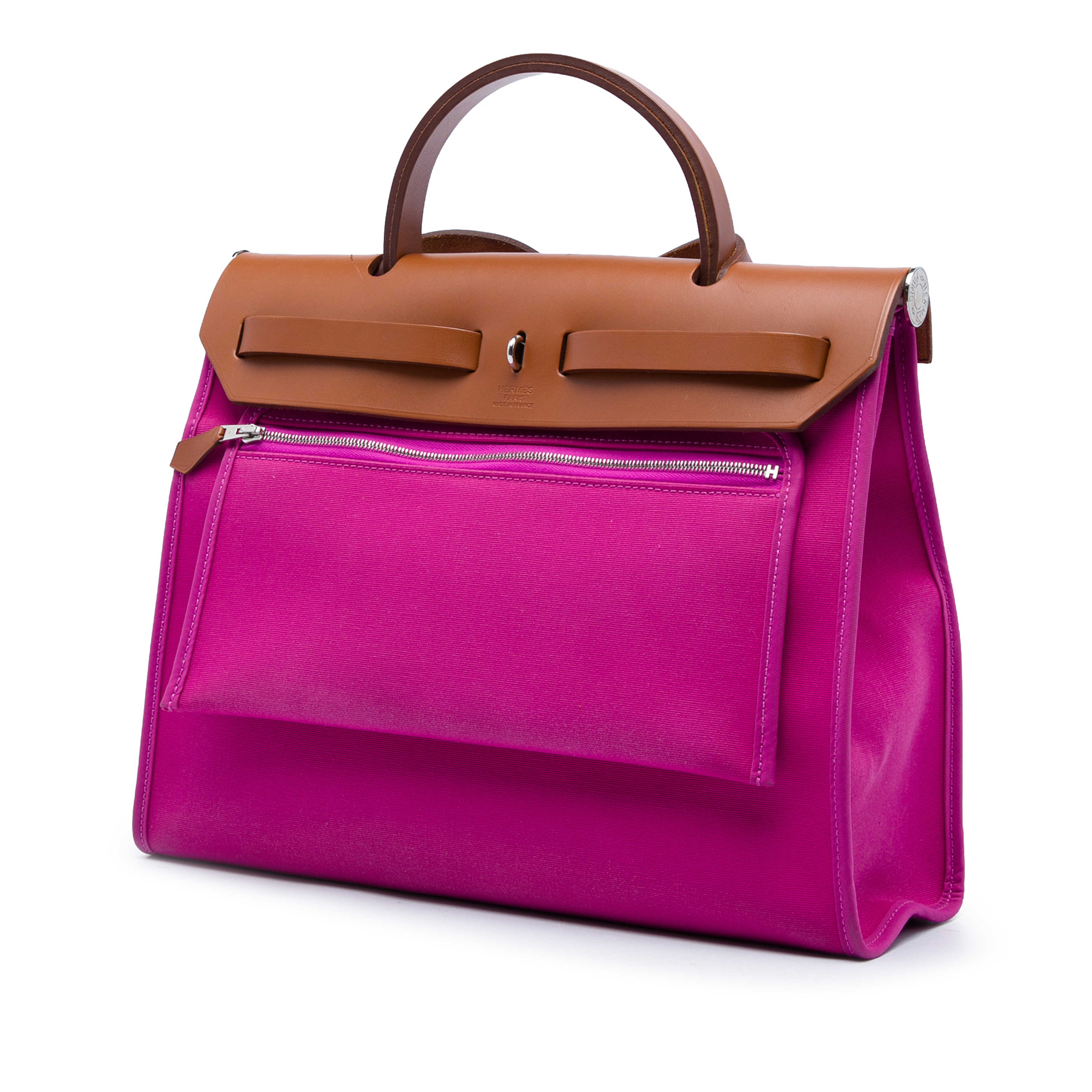 Hermès Toile Herbag Zip 31, från Luxclusif, i färgen rosa. Klicka för att öppna bilden i stort format