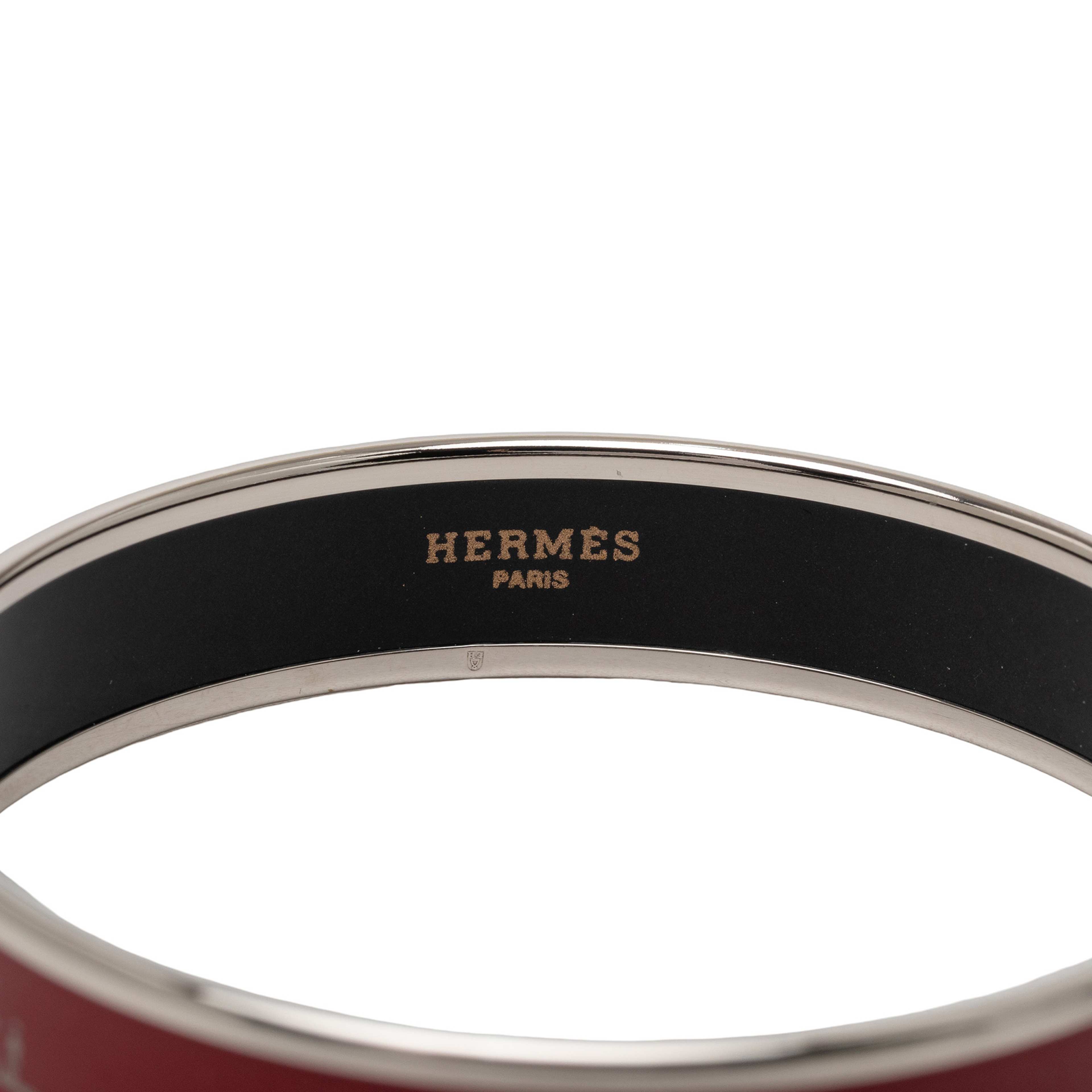 Hermès Narrow Caleche Enamel Bangle 62, från Luxclusif, i färgen dark red. Klicka för att öppna bilden i stort format