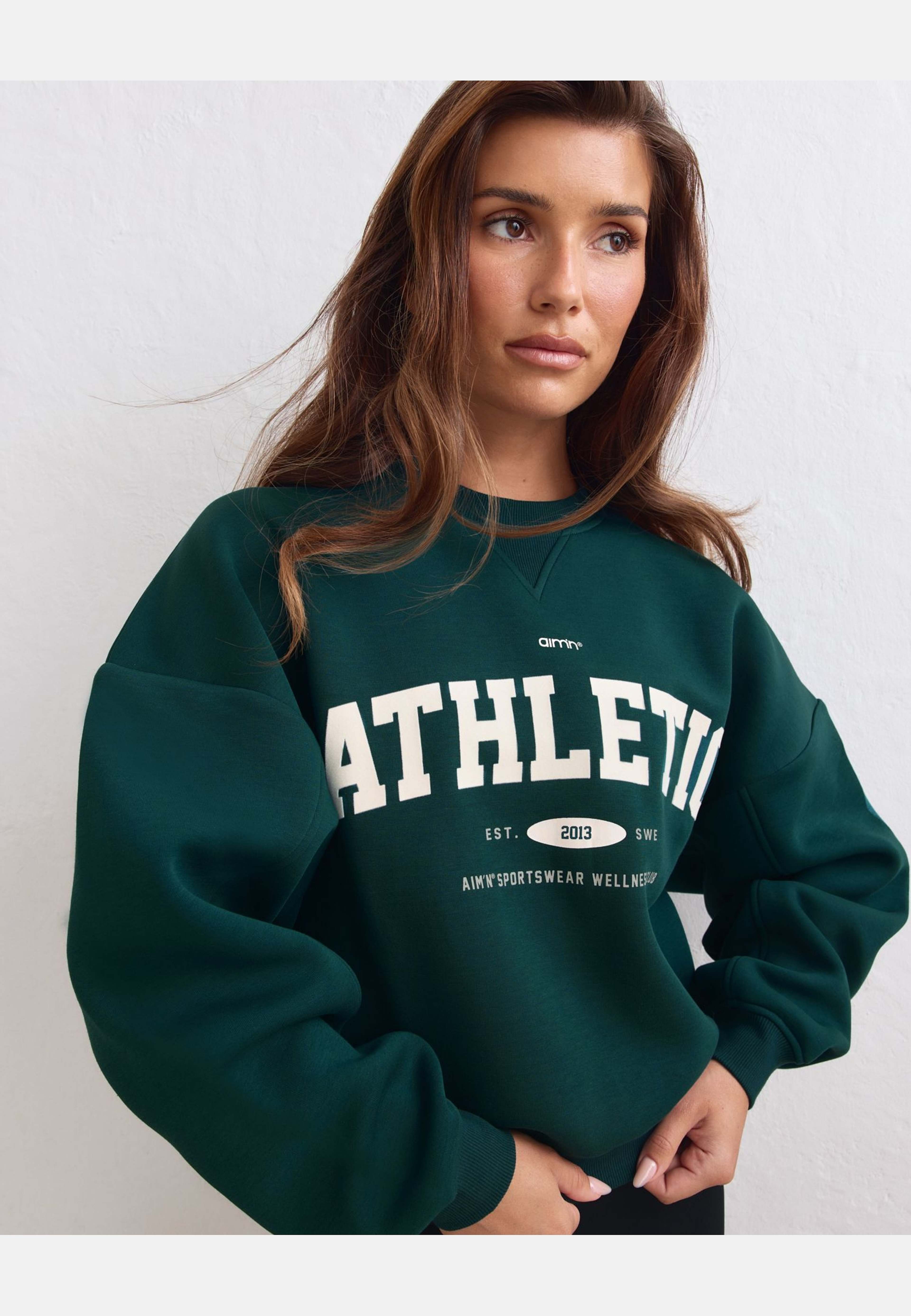Athletics Club Sweatshirt, från aim'n, i färgen lagoon. Klicka för att öppna bilden i stort format