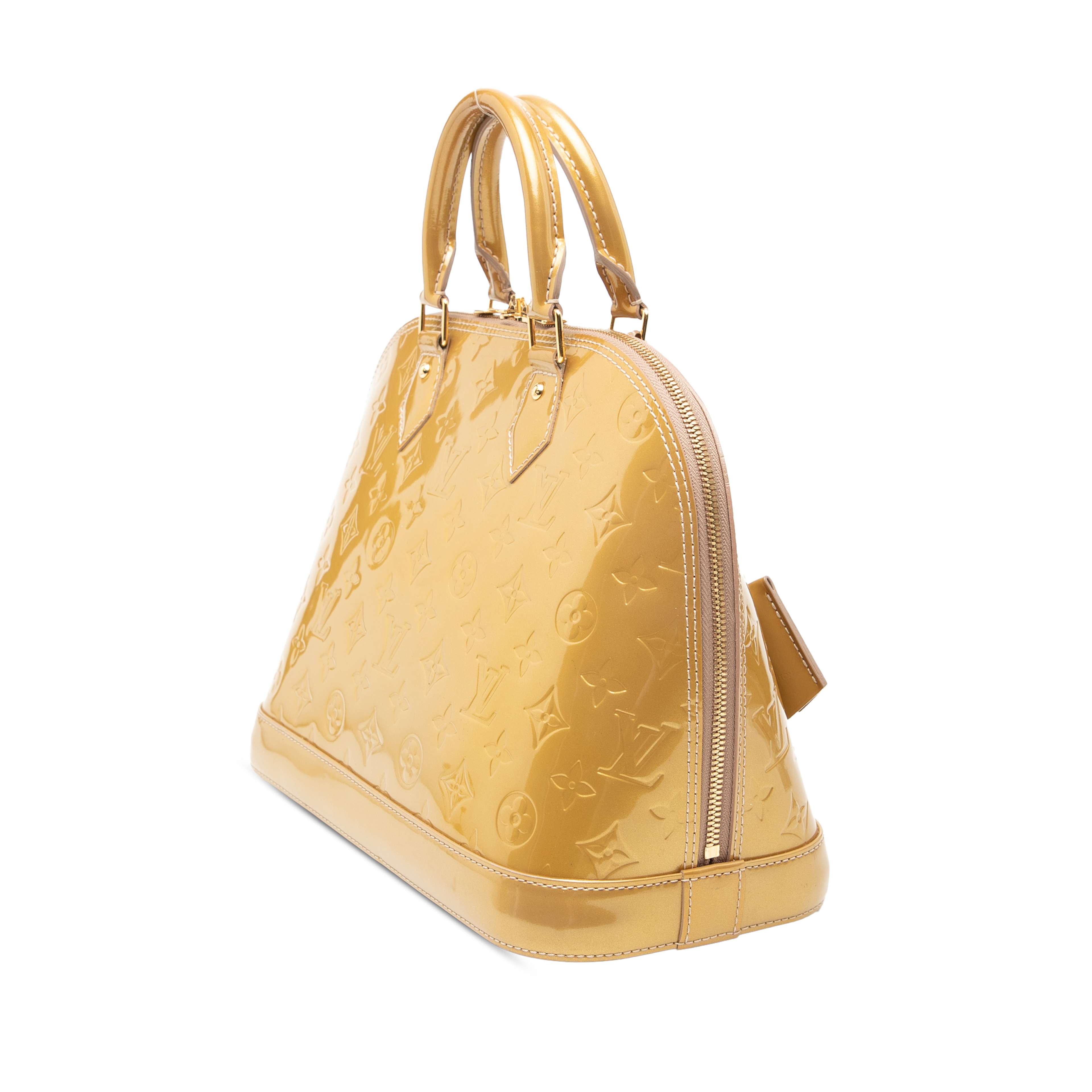 Louis Vuitton Monogram Vernis Alma Pm, från Luxclusif, i färgen gold. Klicka för att öppna bilden i stort format