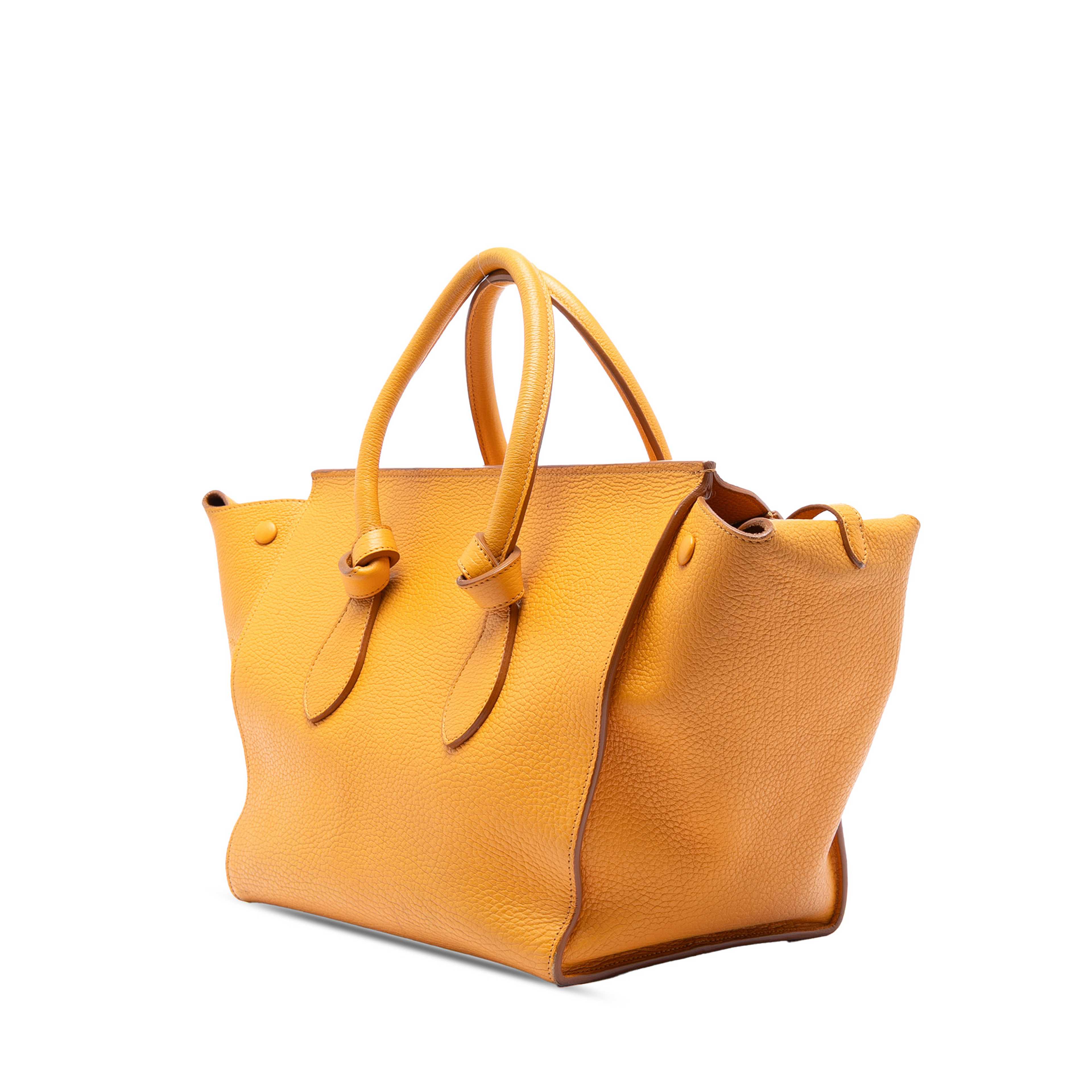 Celine Small Grained Calfskin Tie Knot Handbag, från Luxclusif, i färgen mustard. Klicka för att öppna bilden i stort format